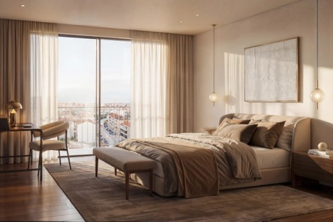 Bright bedroom with floor-to-ceiling windows, a double bed and a desk by the window.