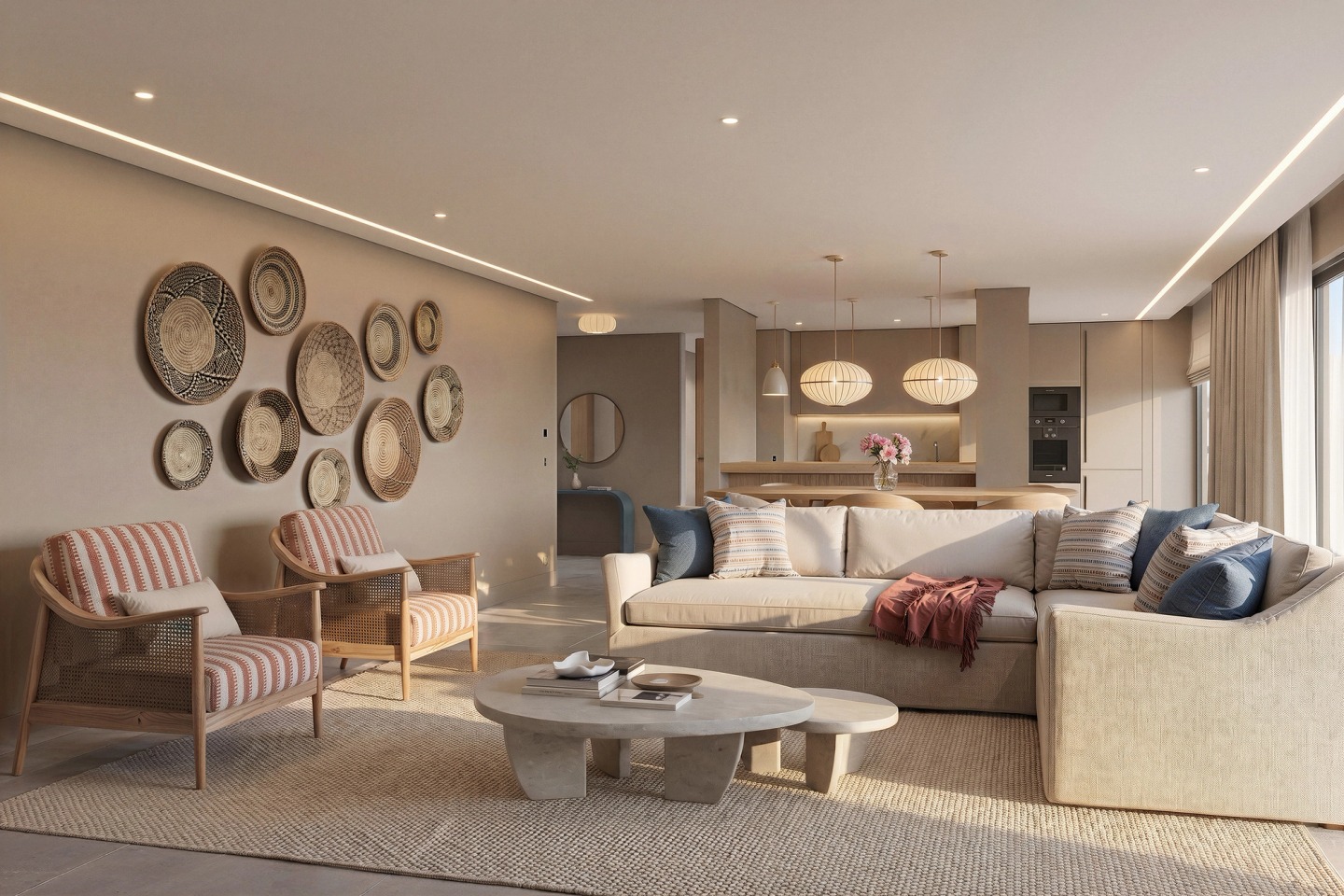 Living room with an L-shaped sofa, cane armchairs and decorative baskets on the wall, in a Conrad Algarve apartment.