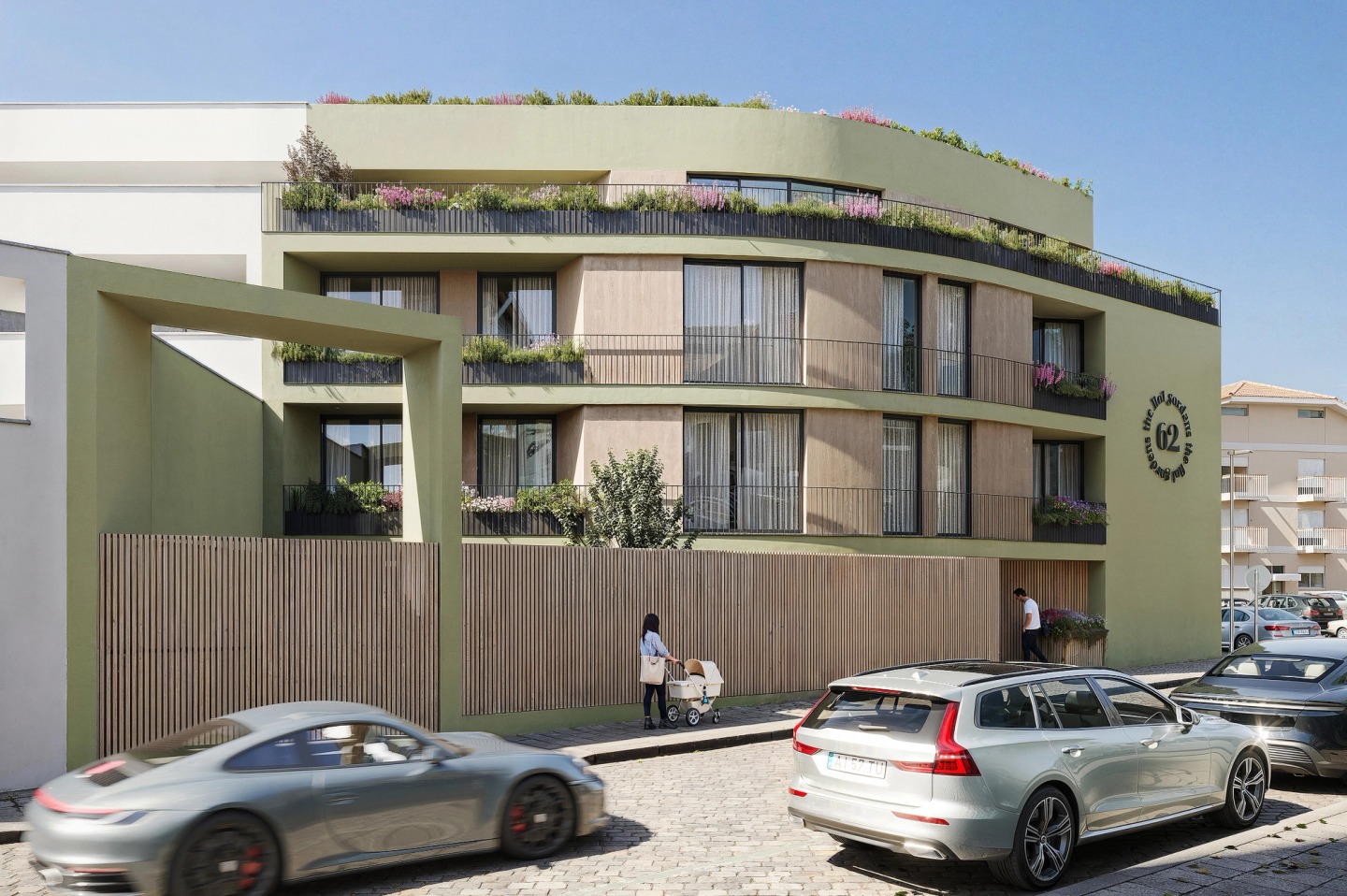 Green façade of 62 The Flat Gardens in Espinho, with flowering balconies, a roof garden and cars on the street.
