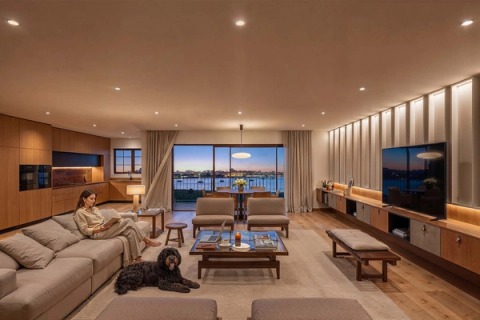 Cosy living room at dusk overlooking the Arade river and Portimão.