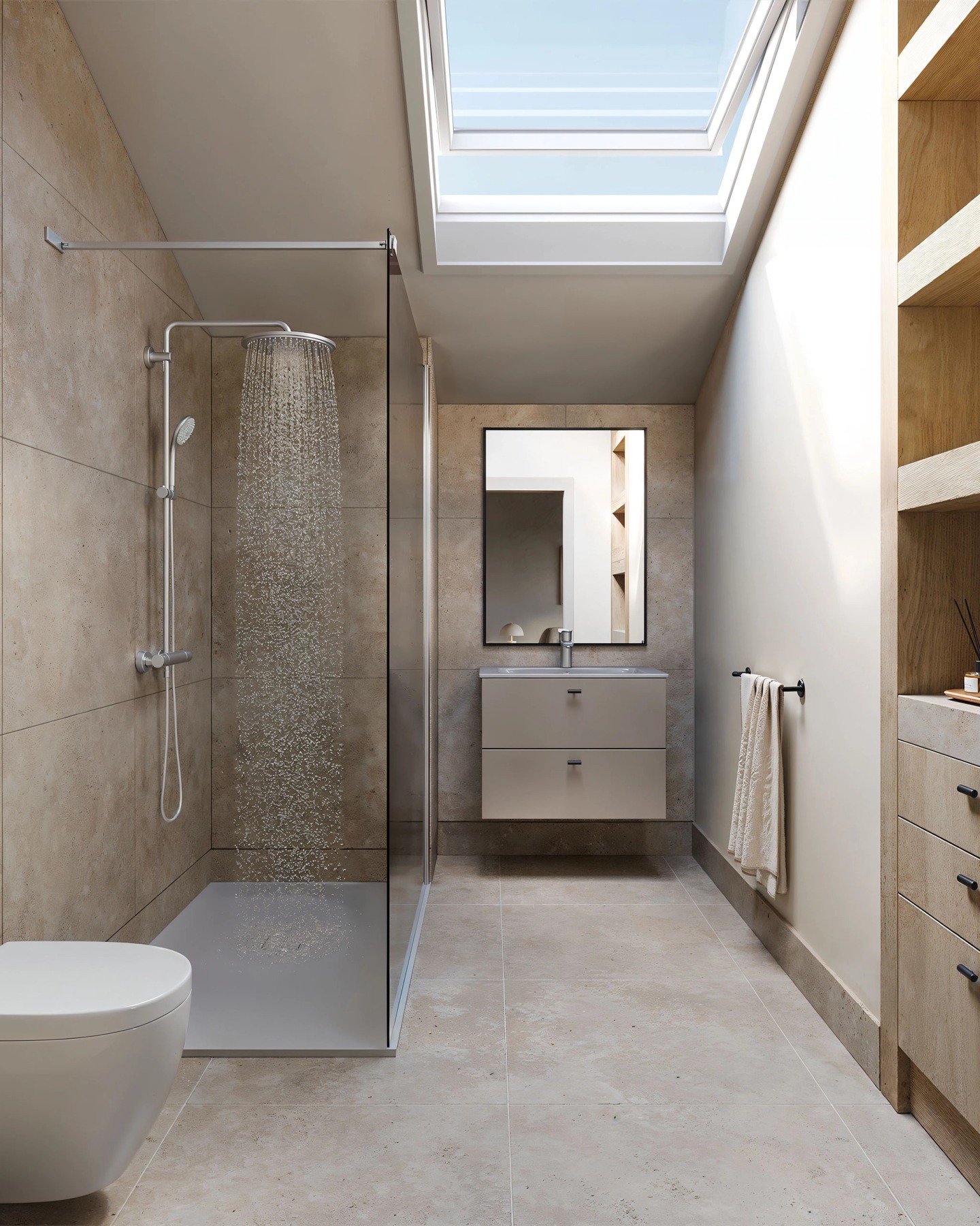 Bathroom under the roof with a skylight, glass shower and timber vanity.