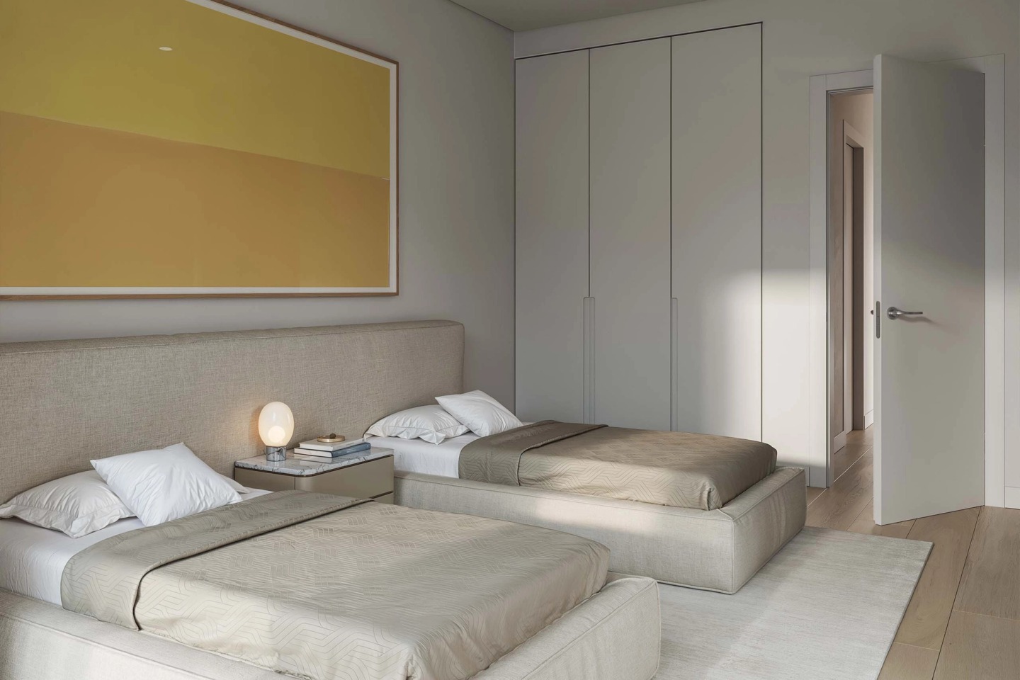 Bedroom with two single beds, a continuous headboard and a yellow-toned artwork.