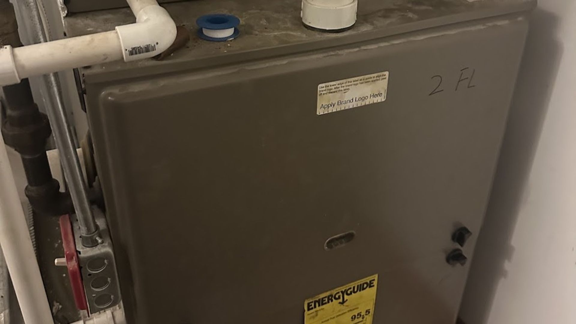 Art HVAC Technician Performing Scheduled Commercial HVAC Maintenance on a Rooftop Unit at a NYC Office Building