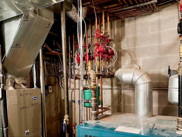 Drain cleaning technician at work