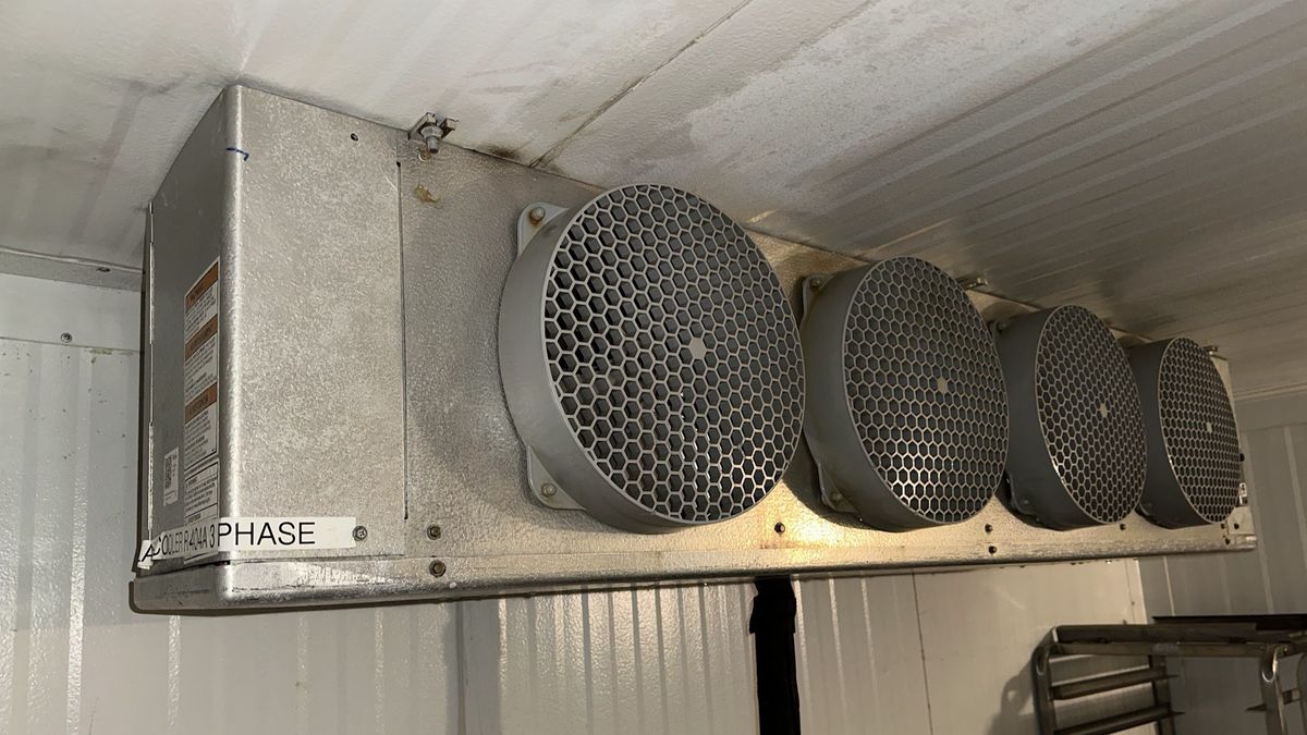 Art HVAC Technician Commissioning a Turbo Air Commercial Prep Table Refrigerator at a NYC Restaurant Kitchen Site