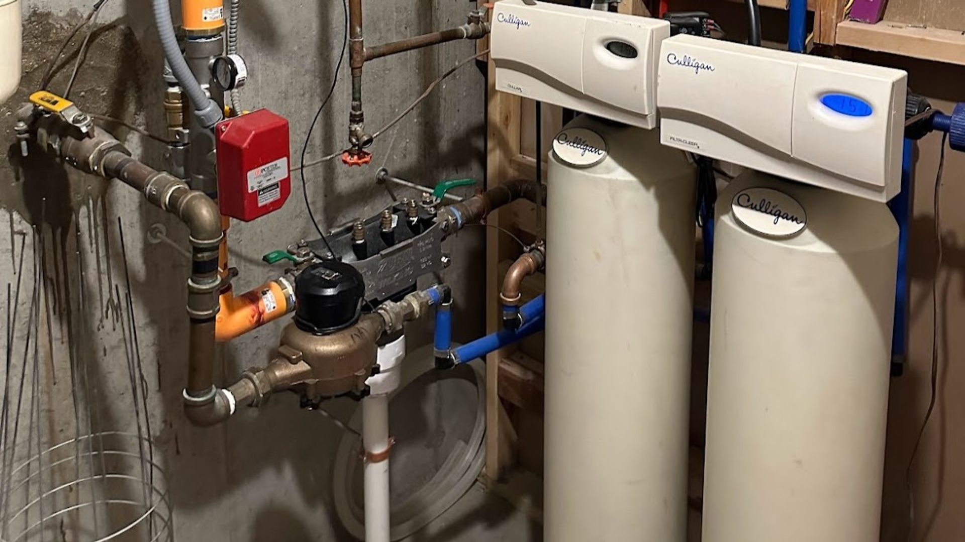 Art HVAC Plumber Installing a Commercial Reverse Osmosis Water Filtration System at a NYC Restaurant Kitchen Site