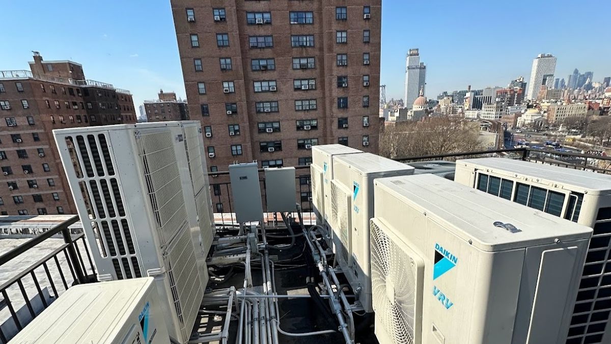 Art HVAC Manhattan HVAC Team Performing Rooftop Unit Maintenance on a Midtown Commercial Building HVAC Installation