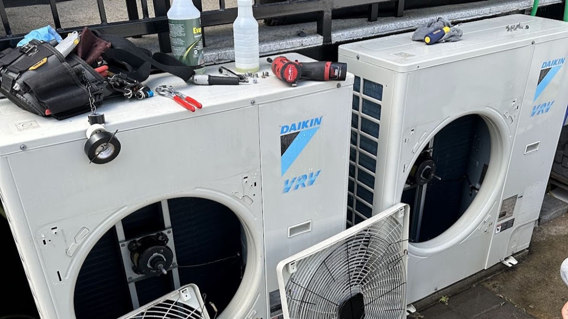 Art HVAC Technician Performing Scheduled VRV System Maintenance on a Daikin Outdoor Condenser at a NYC Office Site