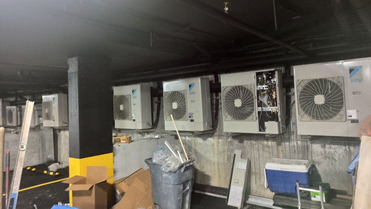 Art HVAC NYC Commercial HVAC Service Agreement Document on Desk During a Contract Review with a NYC Business Owner