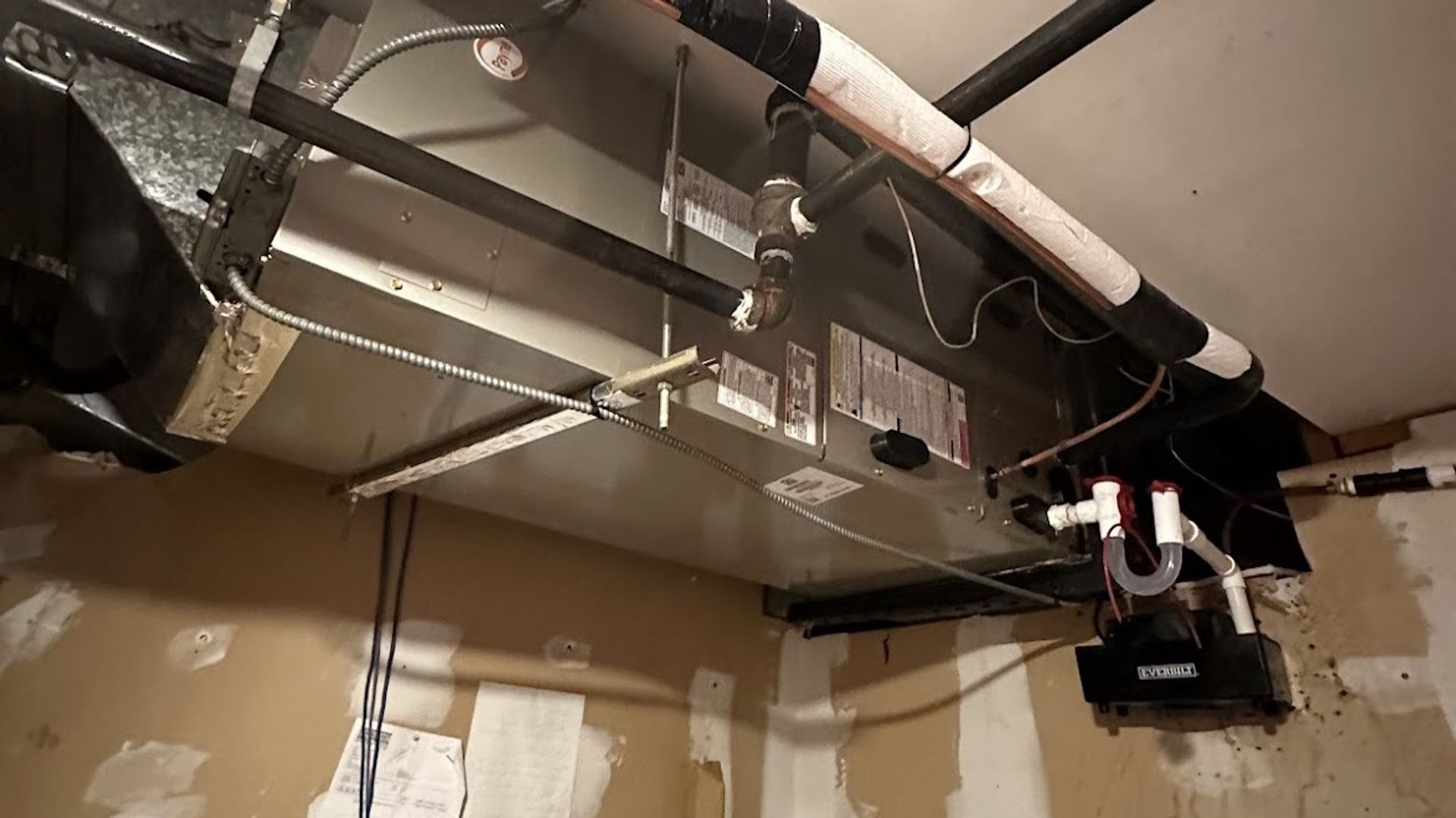 Condensate Drain Line Services in NYC by Art HVAC Licensed Commercial HVAC and Plumbing Contractor Expert Team Work