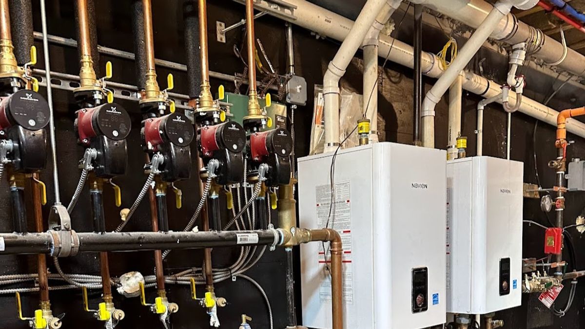 Art HVAC Technician Installing a True Commercial Reach in Refrigerator at a NYC Restaurant Commercial Kitchen Site