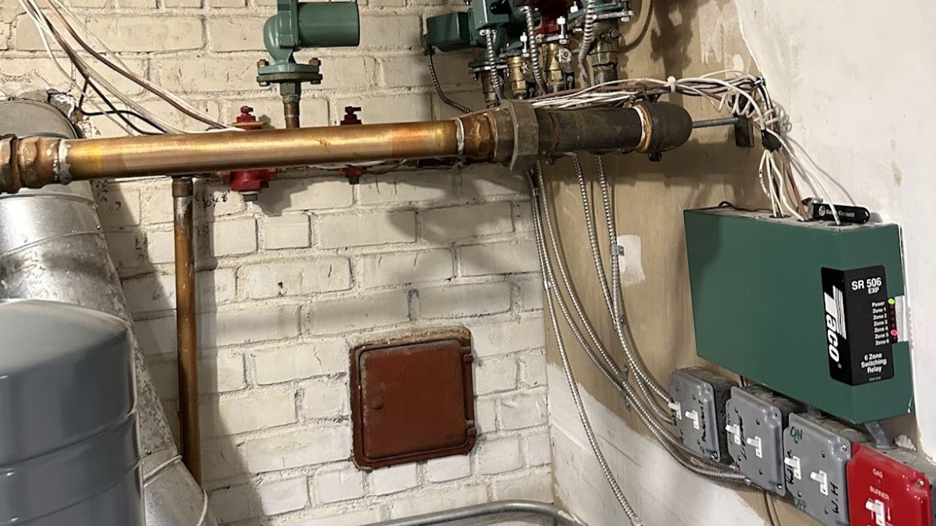 Art HVAC Plumber Clearing a Blocked Toilet Drain Line at a NYC Commercial Office Building Emergency Plumbing Service