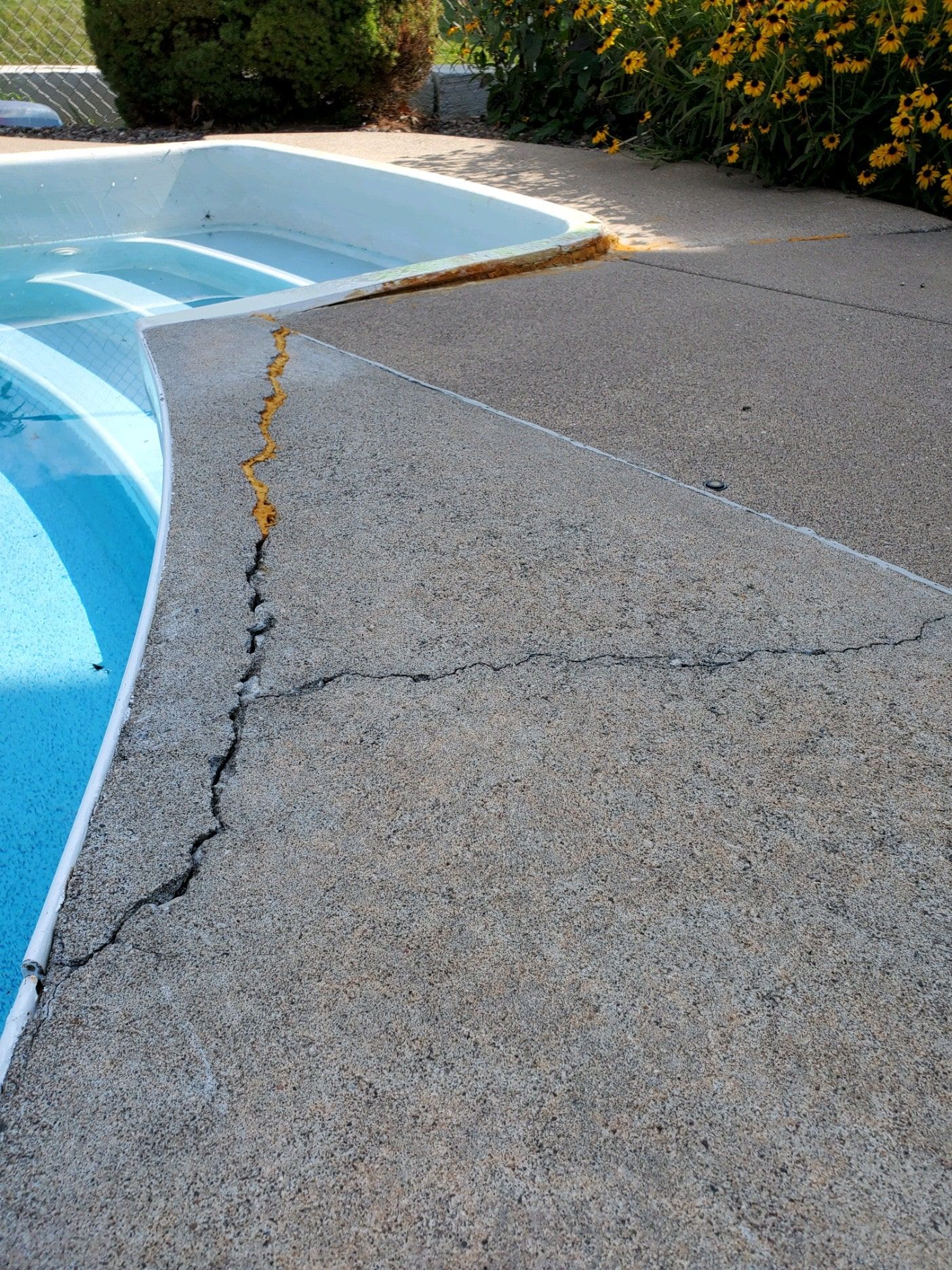 Pool Deck Concrete Cracking and Settlement