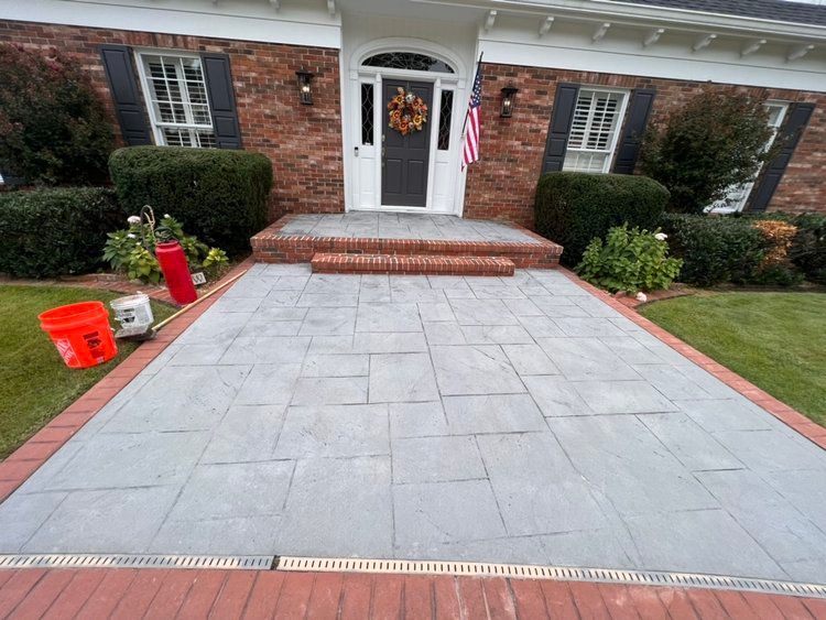 Modern driveway with smooth finish and integrated lighting