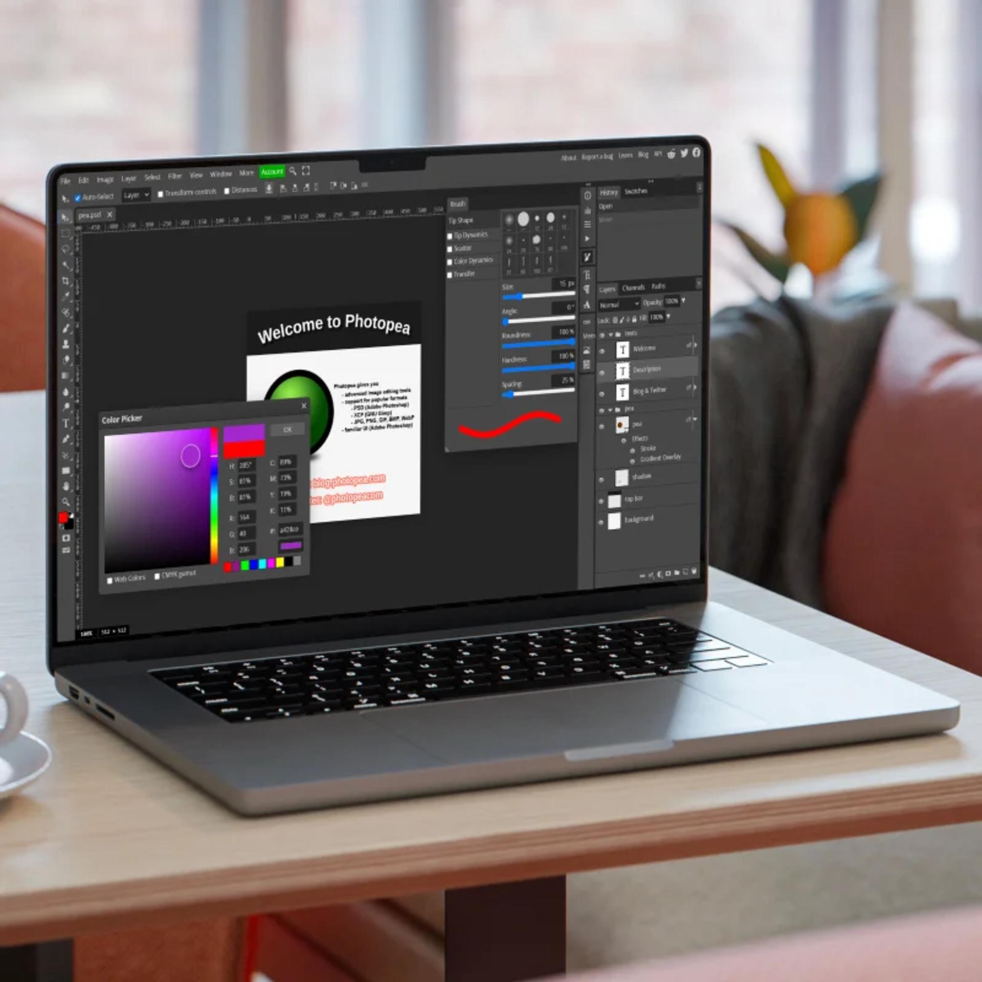 Photopea image editor displayed on a laptop screen