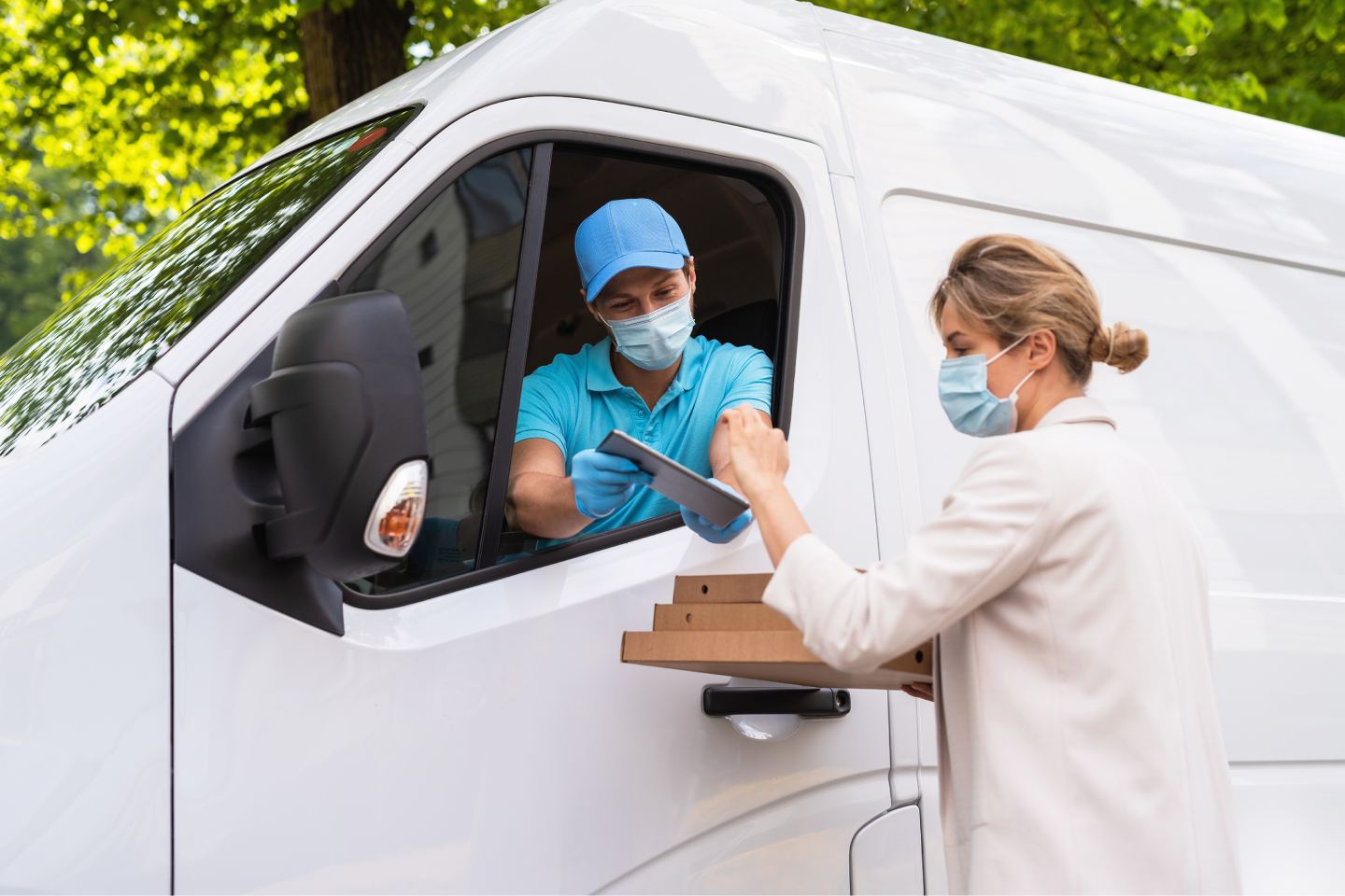 Healthcare worker handing over a sealed medical vial