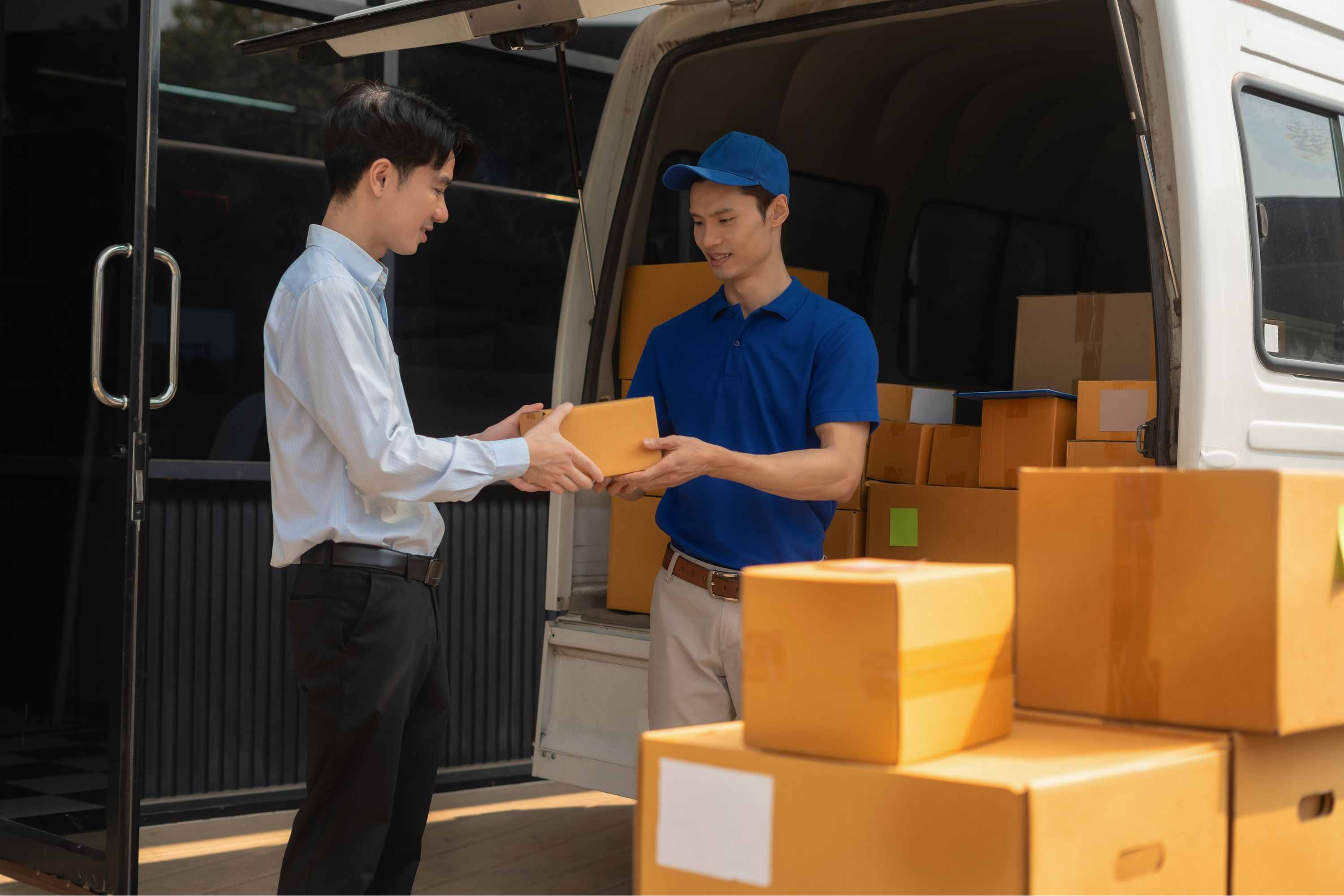 Fast Freight Forward driver loading a van