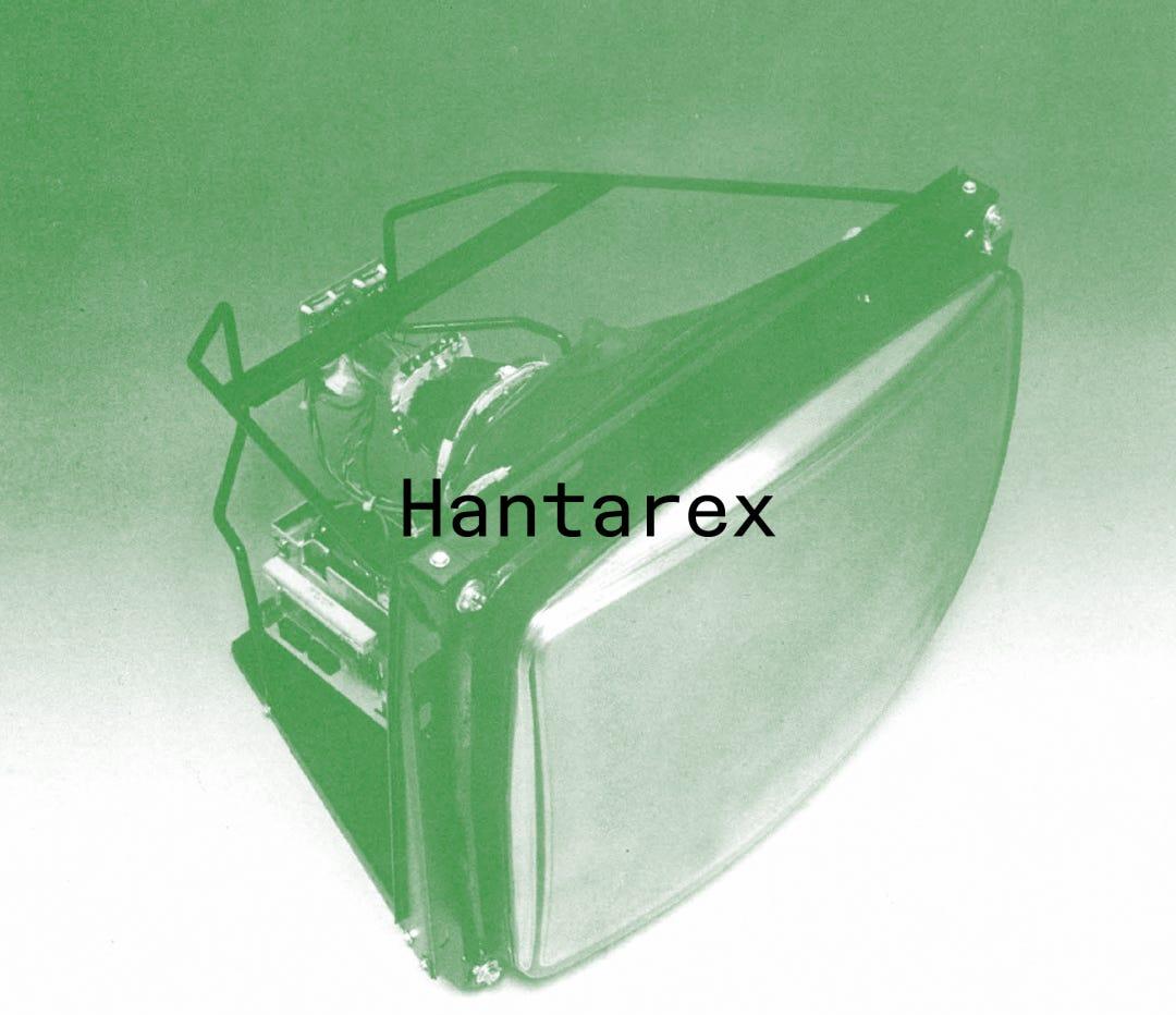Green-tinted Hantarex electronic display with the word “Hantarex” set across it.