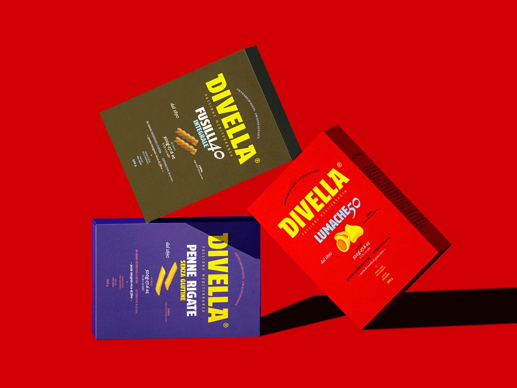 Red Divella pasta package photographed against a red background.