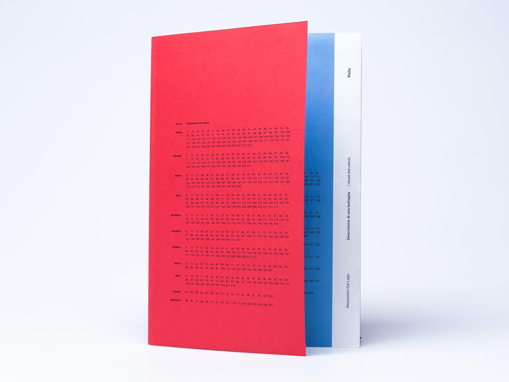 Red book with small printed text and bright blue pages.