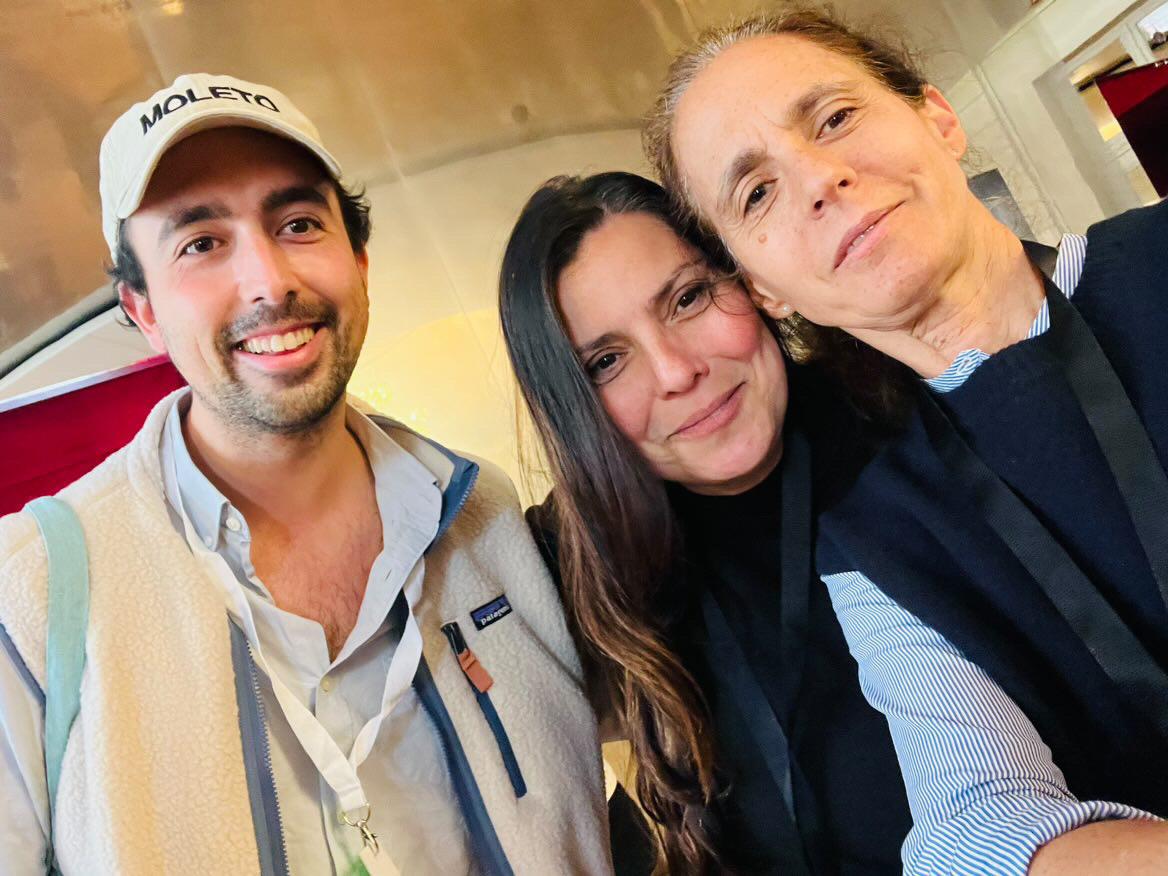 Three people posing for a selfie.