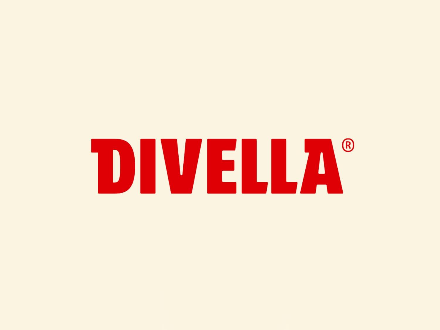 Three colorful Divella pasta boxes arranged on a red background.