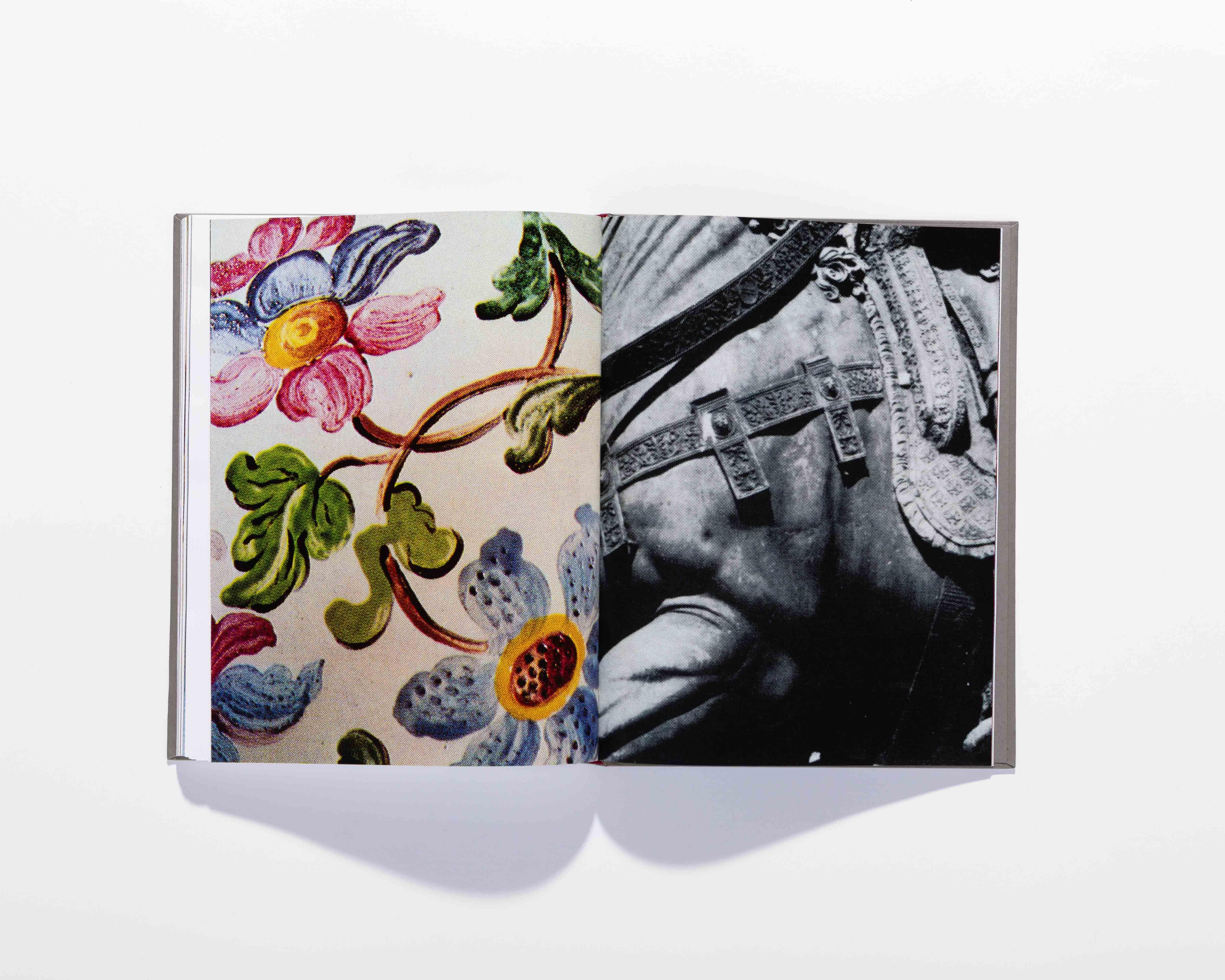 Open Il Crampo di Gesso book combining a colorful floral pattern with a black-and-white garment photograph.