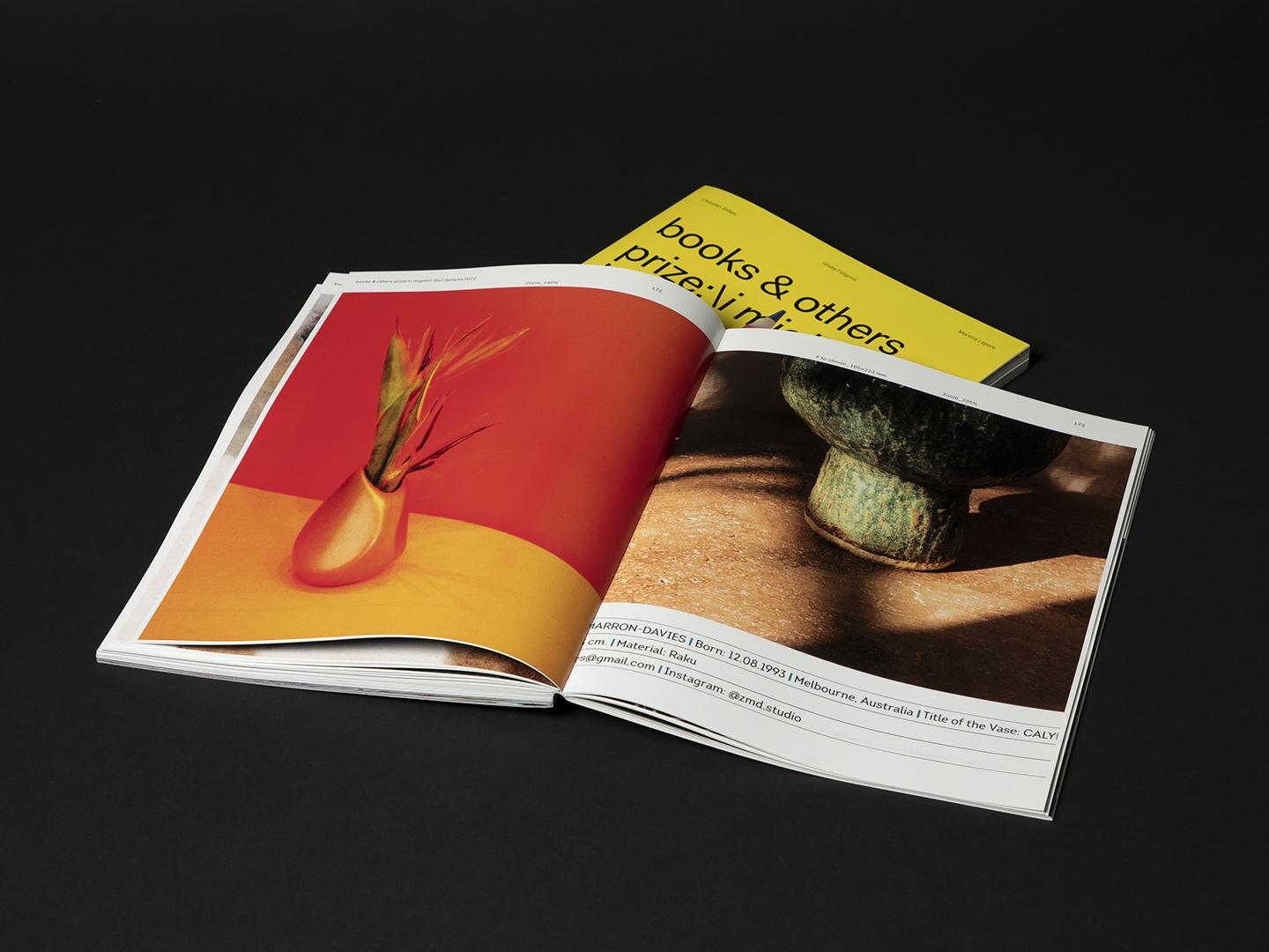 Open Books & others publication on a black background.