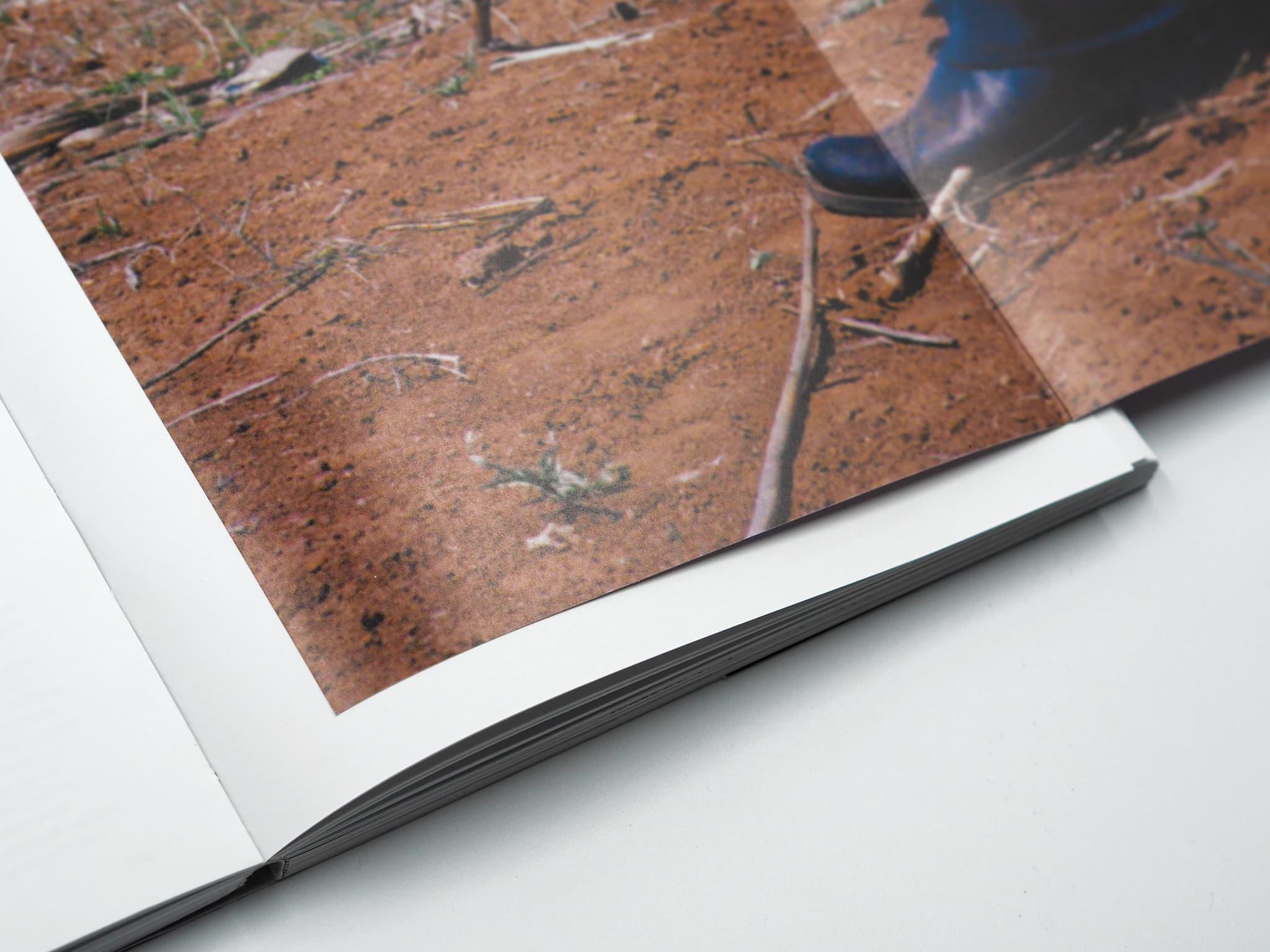 Close-up of a Voltare pagina book page with a long list of project and collaborator names.