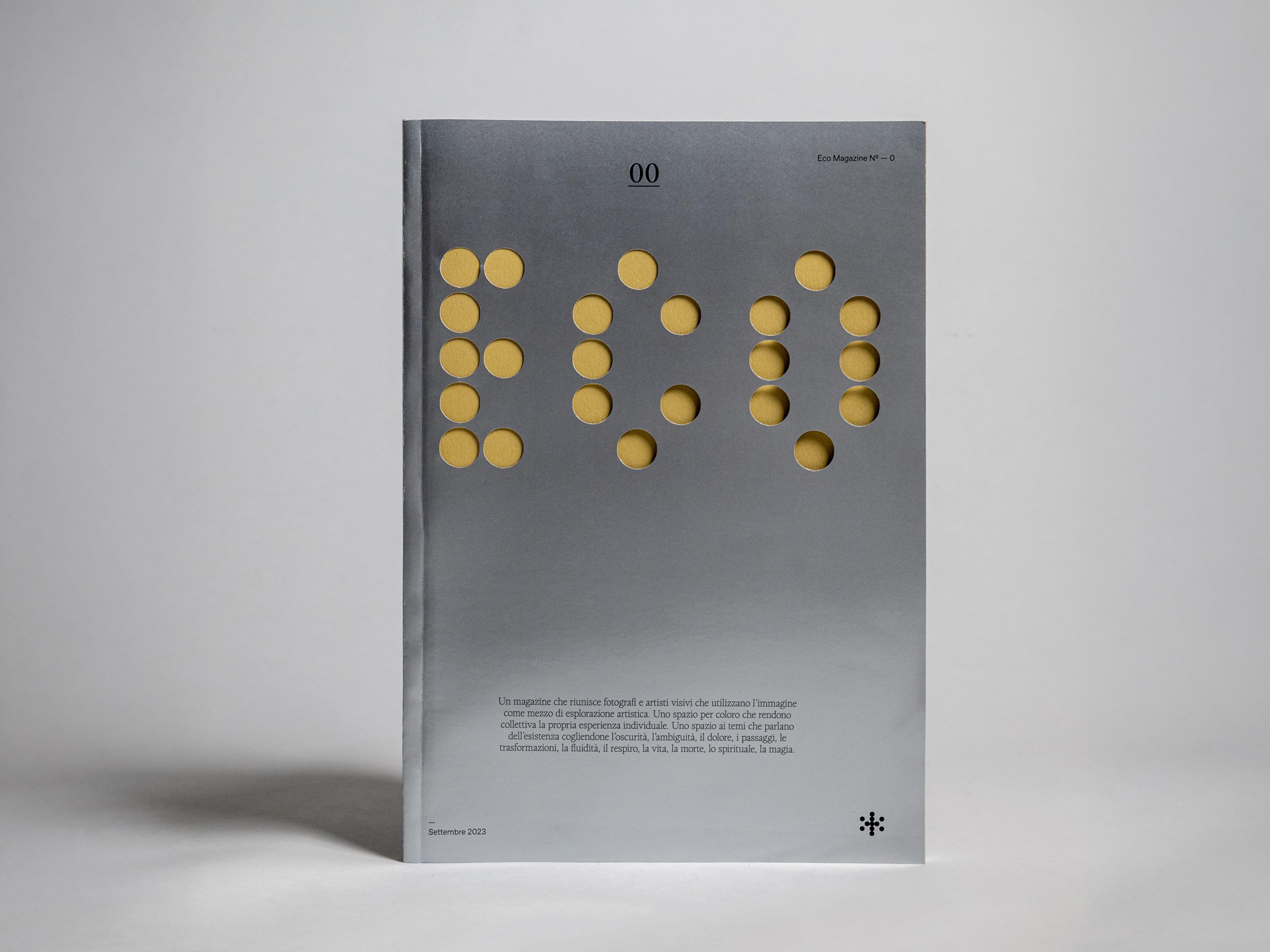 Grey Eco Magazine cover with yellow dot lettering.