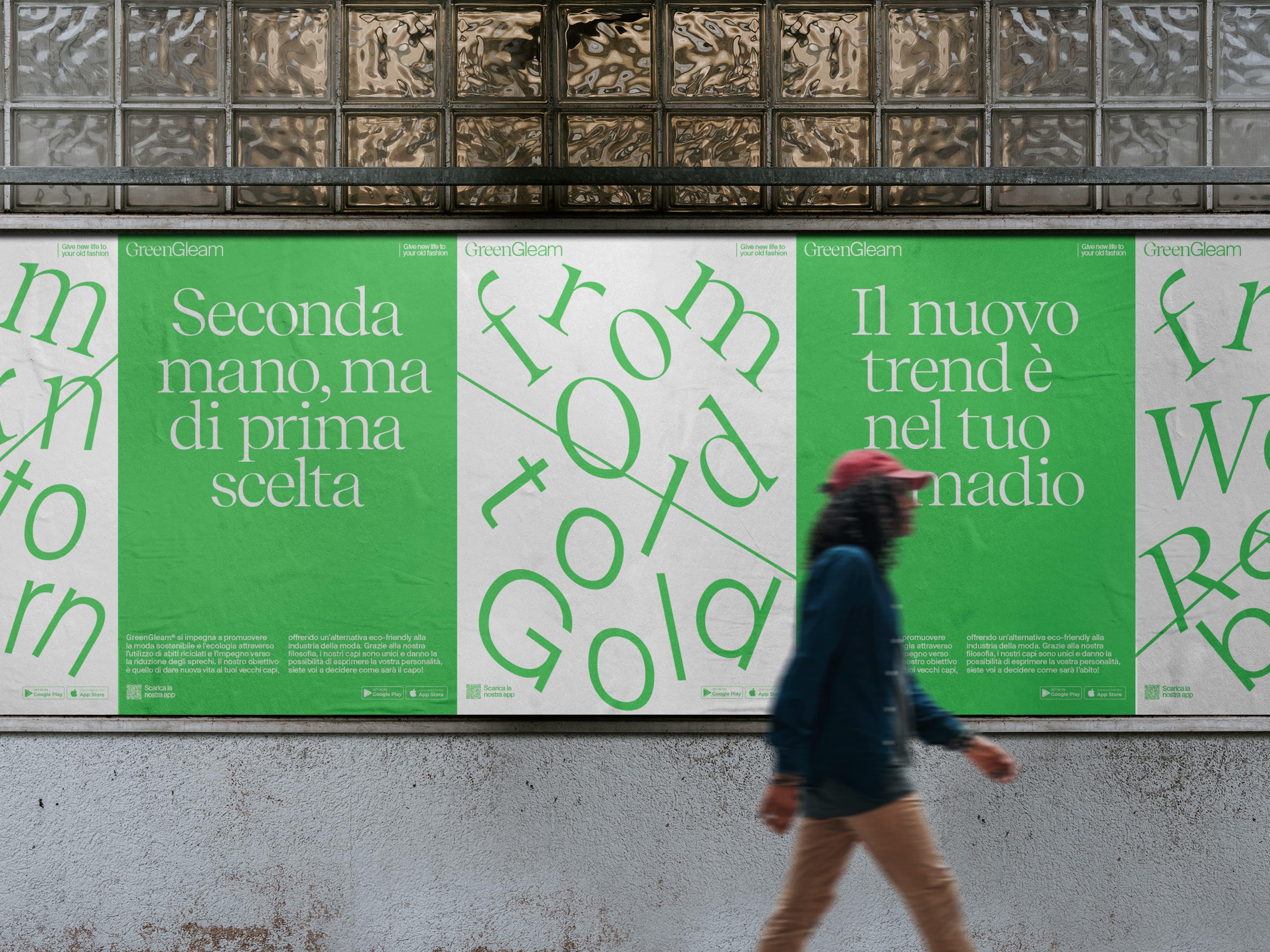 Green posters on a tiled wall beside a person walking past.