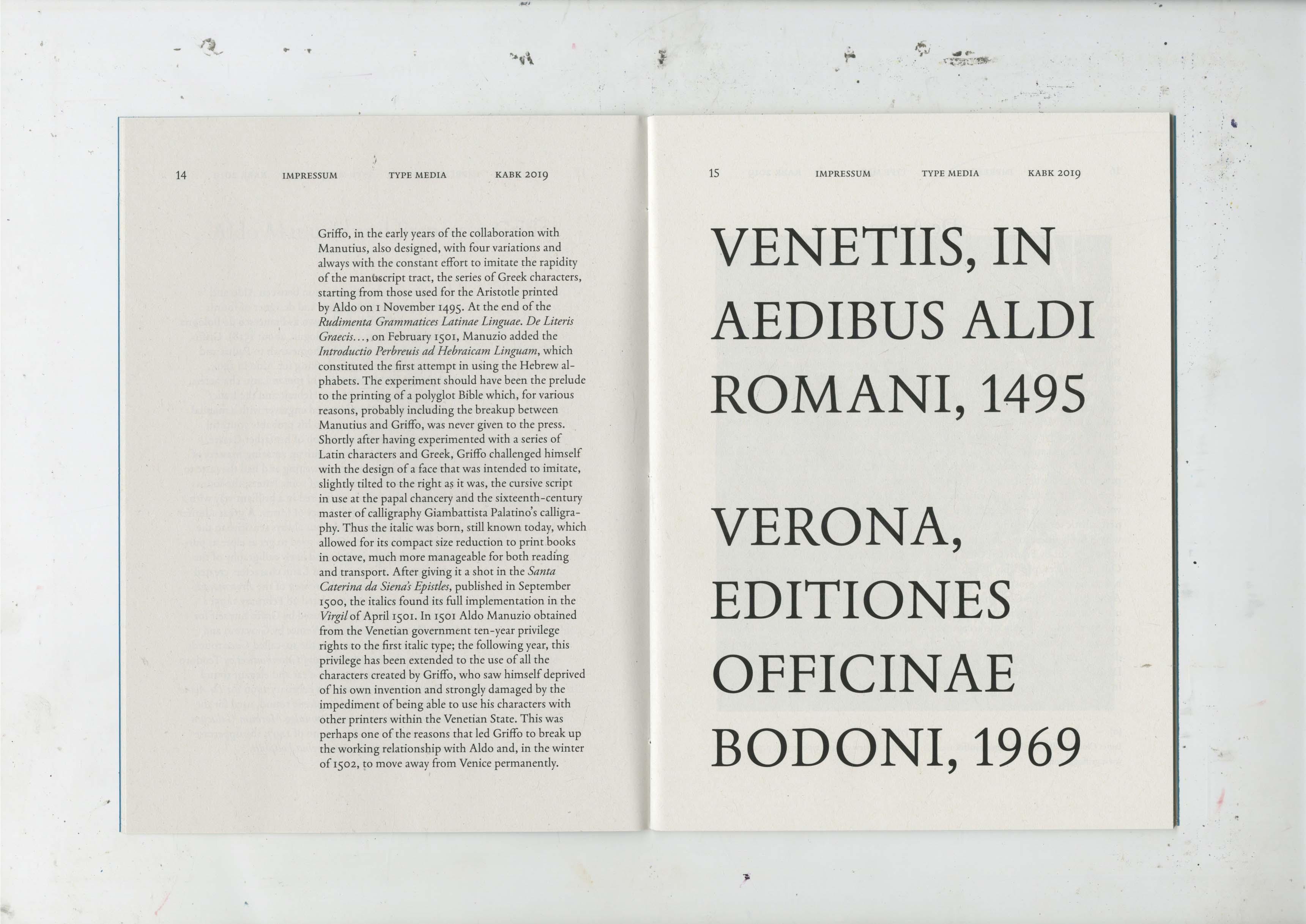 Open Impressum book showing Italian text and a title page.