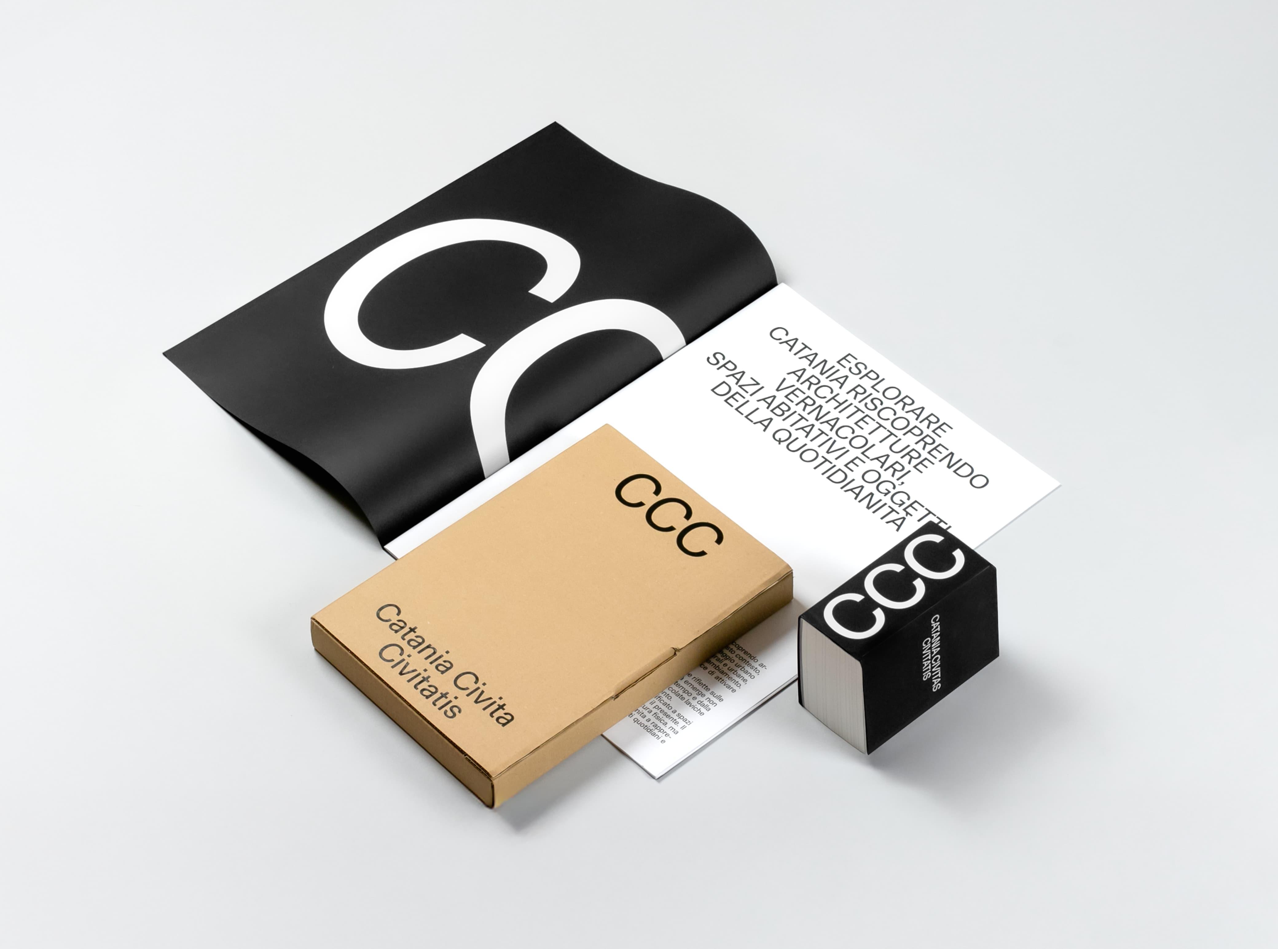 CCC booklets, cards and a black folder on a white background.