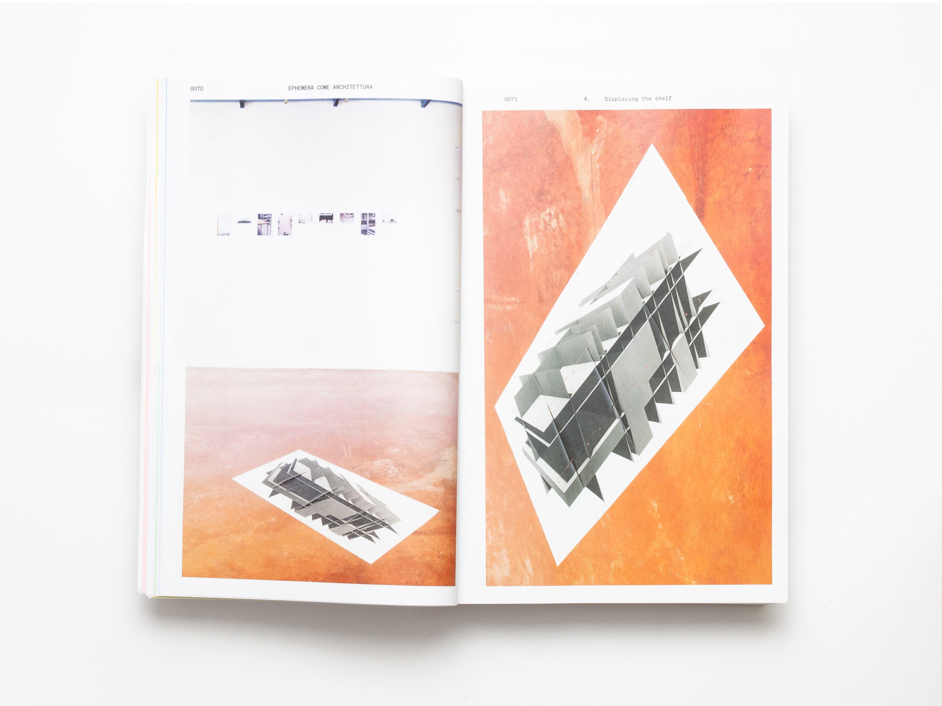 Open Ephemera publication spread with a black-and-white architectural model on orange pages.