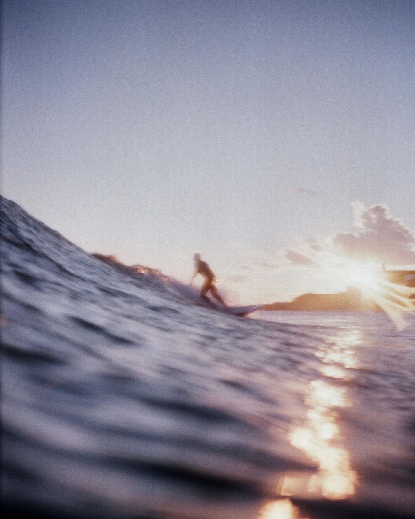 Sunshine glistening against an ocean wave