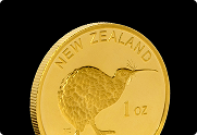a gold coin from new zealand with a kiwi on it