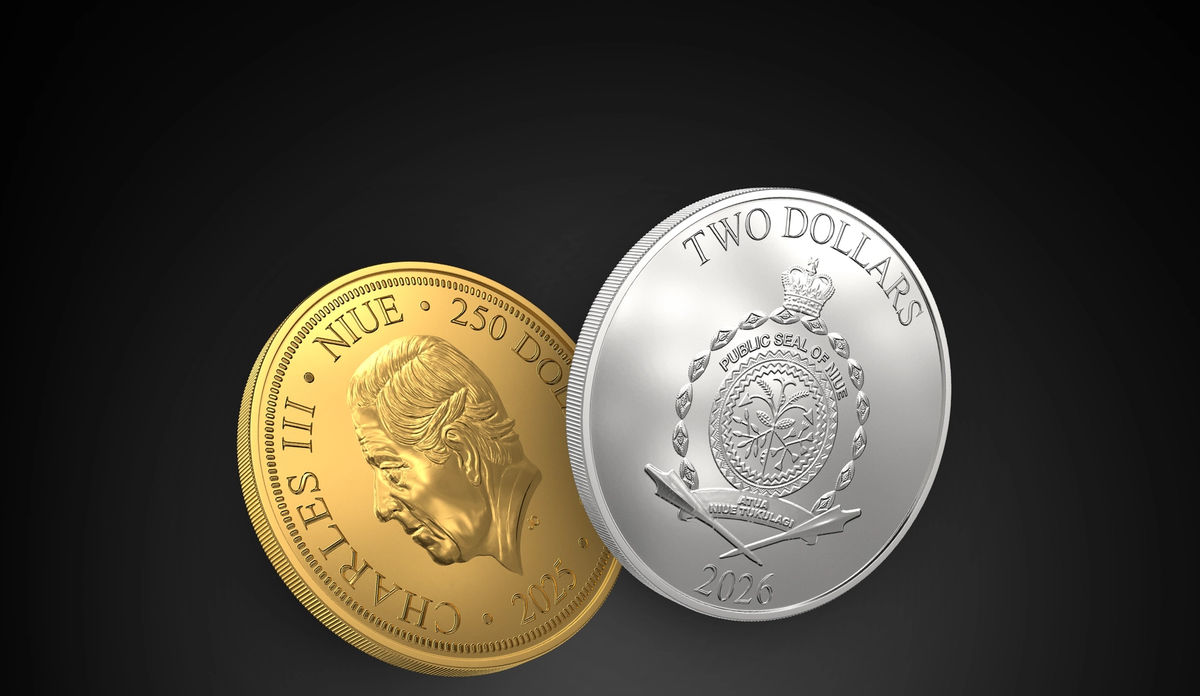 Gold and silver Niue coins in a black background