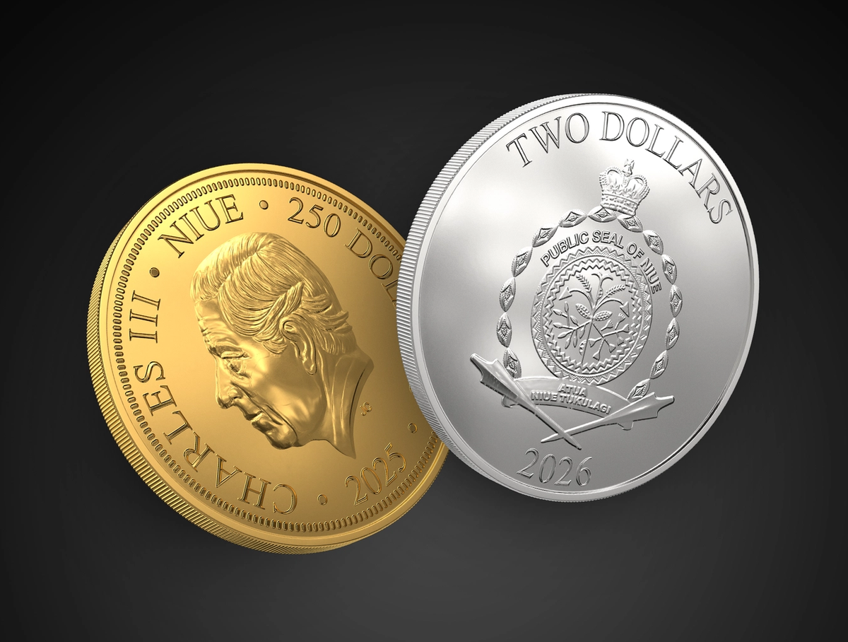 Gold and silver Niue coins in a black background