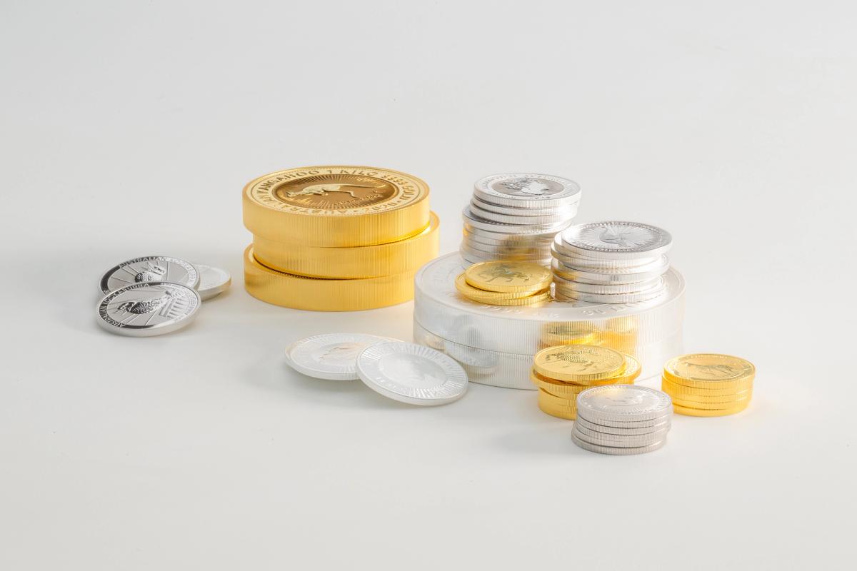 Stacks of shiny gold bars. The image conveys wealth and luxury under warm lighting.