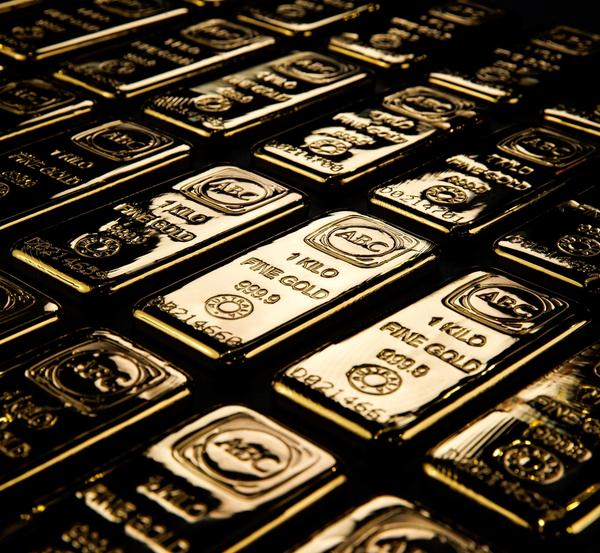 Gold bars in a dark background
