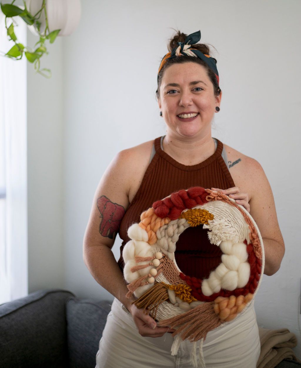 Rachel holding a finished wreath