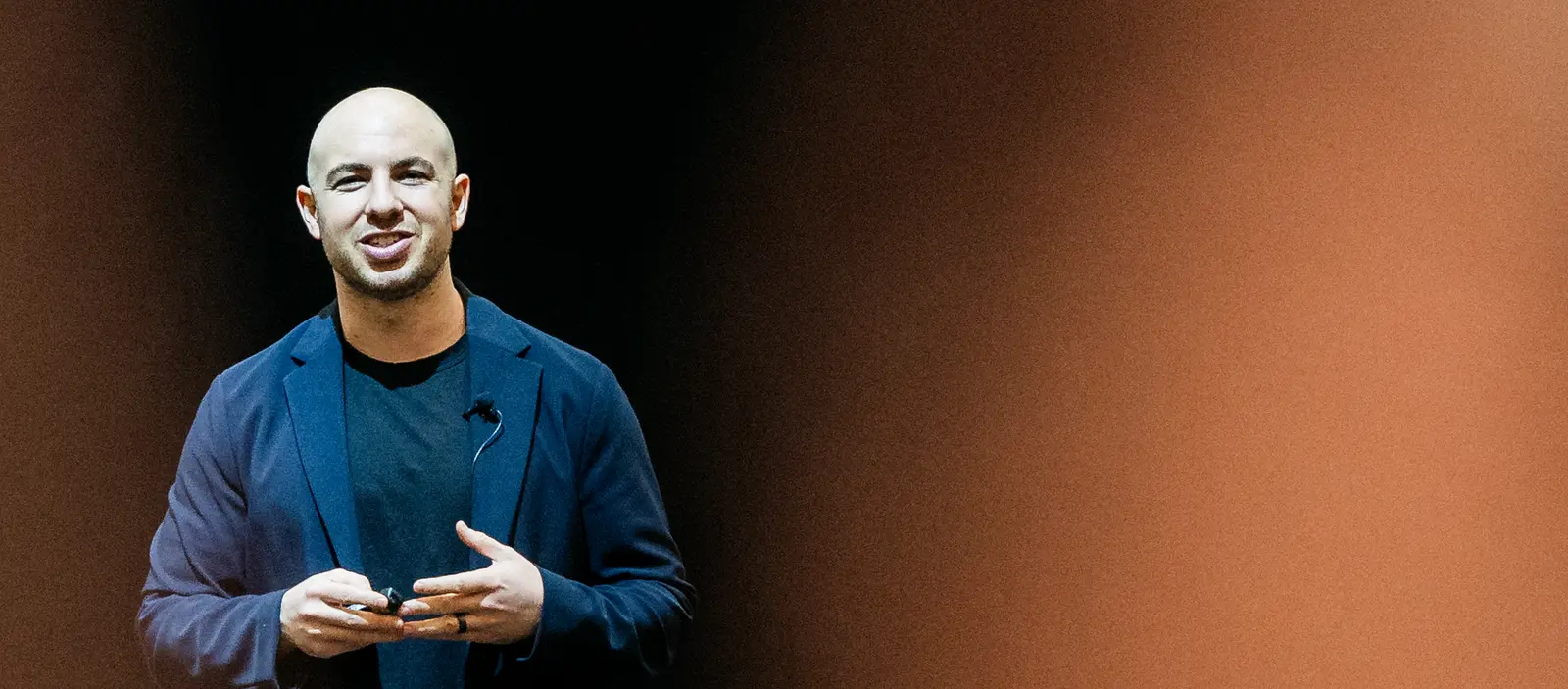 Danny Goldberg speaking on stage at a leadership summit