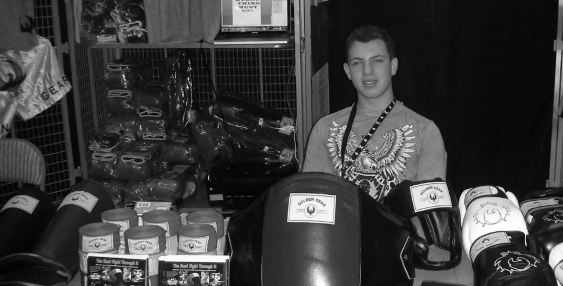 Danny aged 14 behind his Golden Gear boxing equipment stall