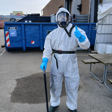 technician working safely in controlled environment