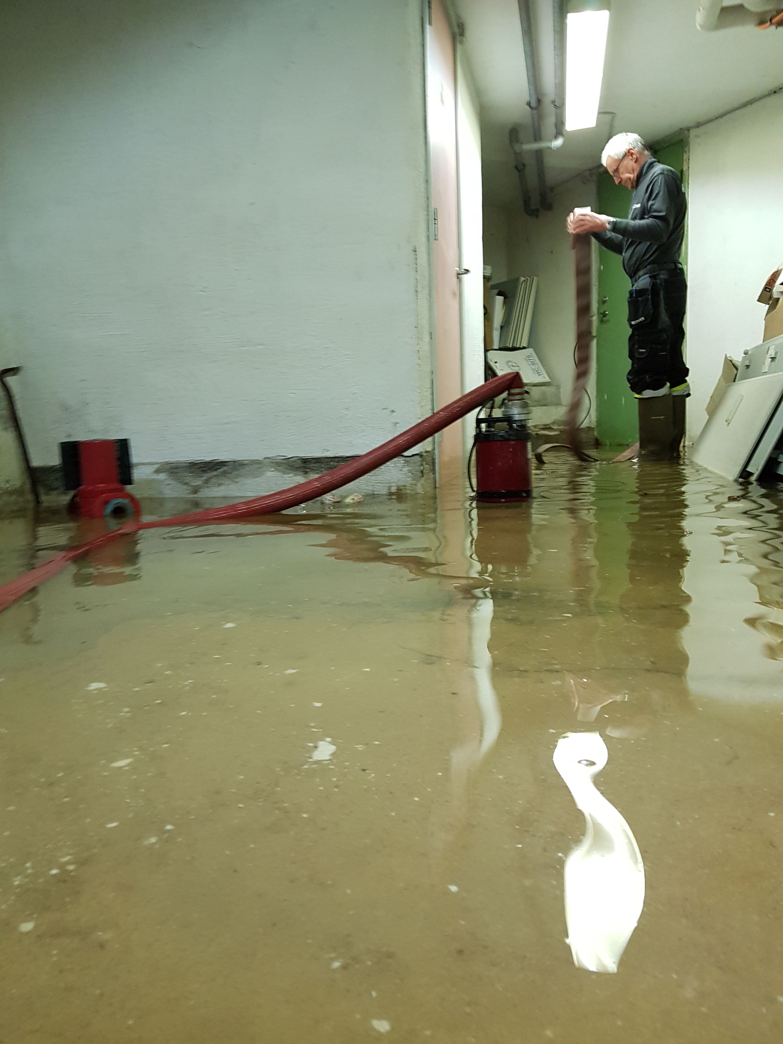 technician performing restoration work indoors