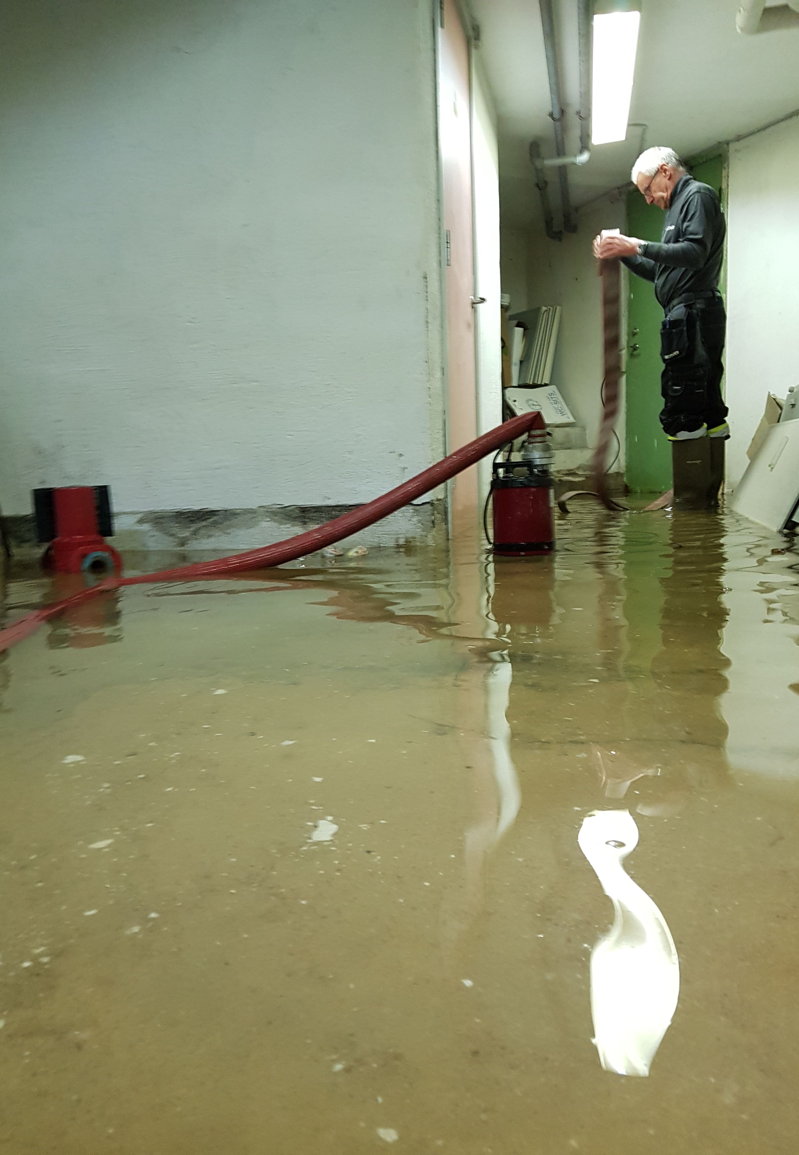 technician performing restoration work indoors