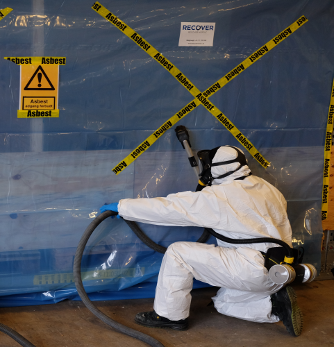 technician working safely in controlled environment