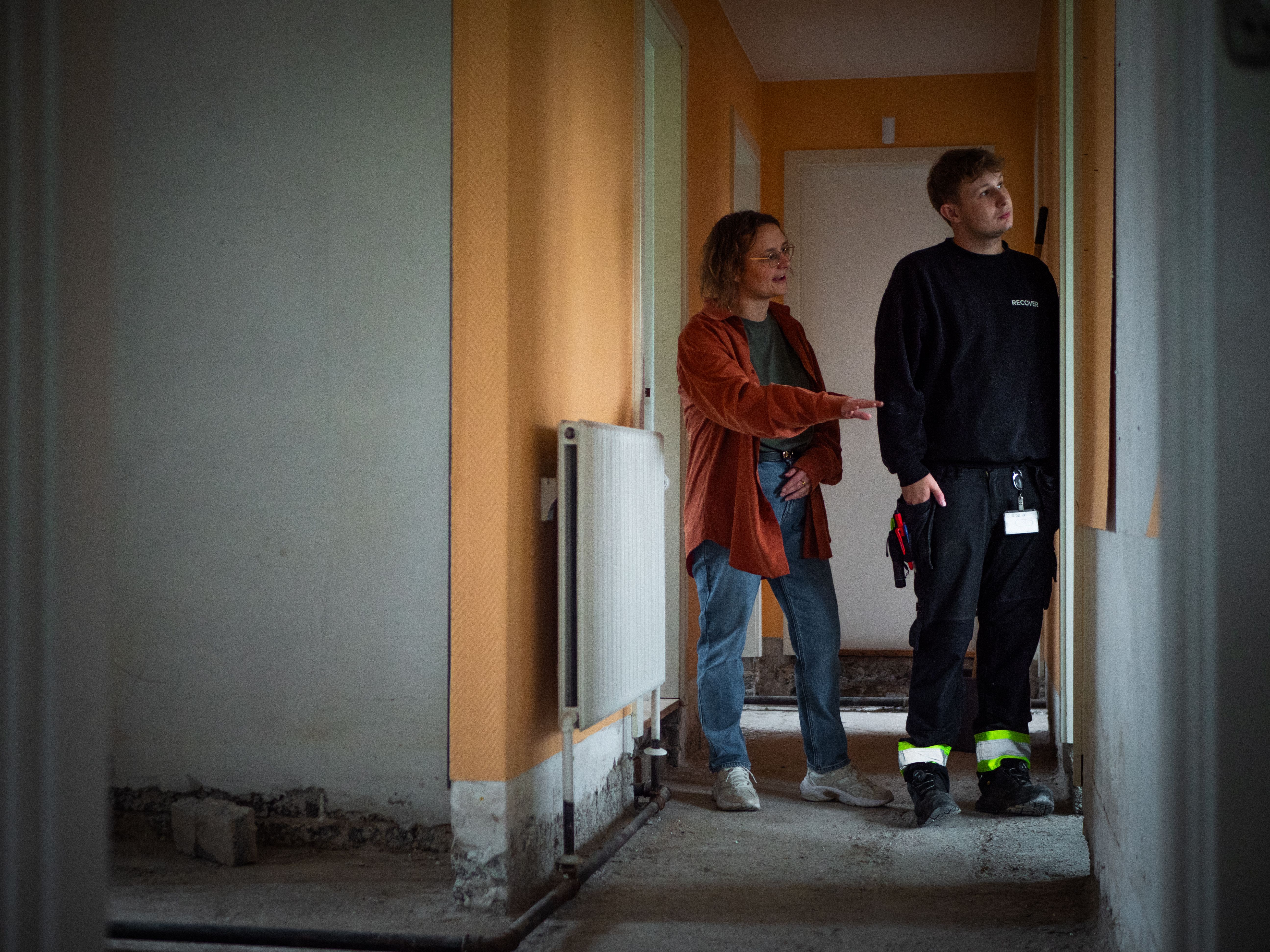 Technician inspecting a home with a resident to provide fast and reliable restoration support.
