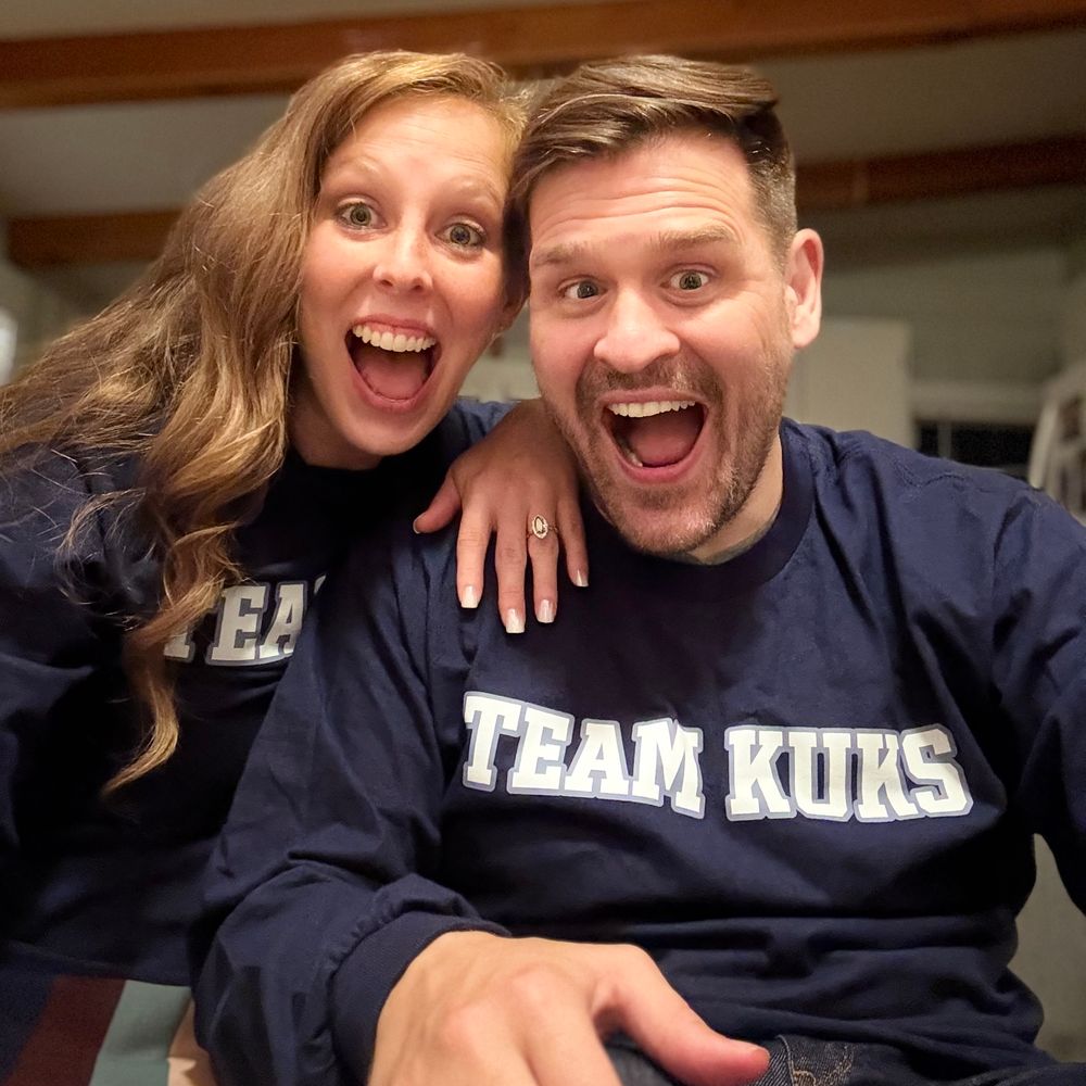 Amanda and Steven in their Team Kuks sweatshirts