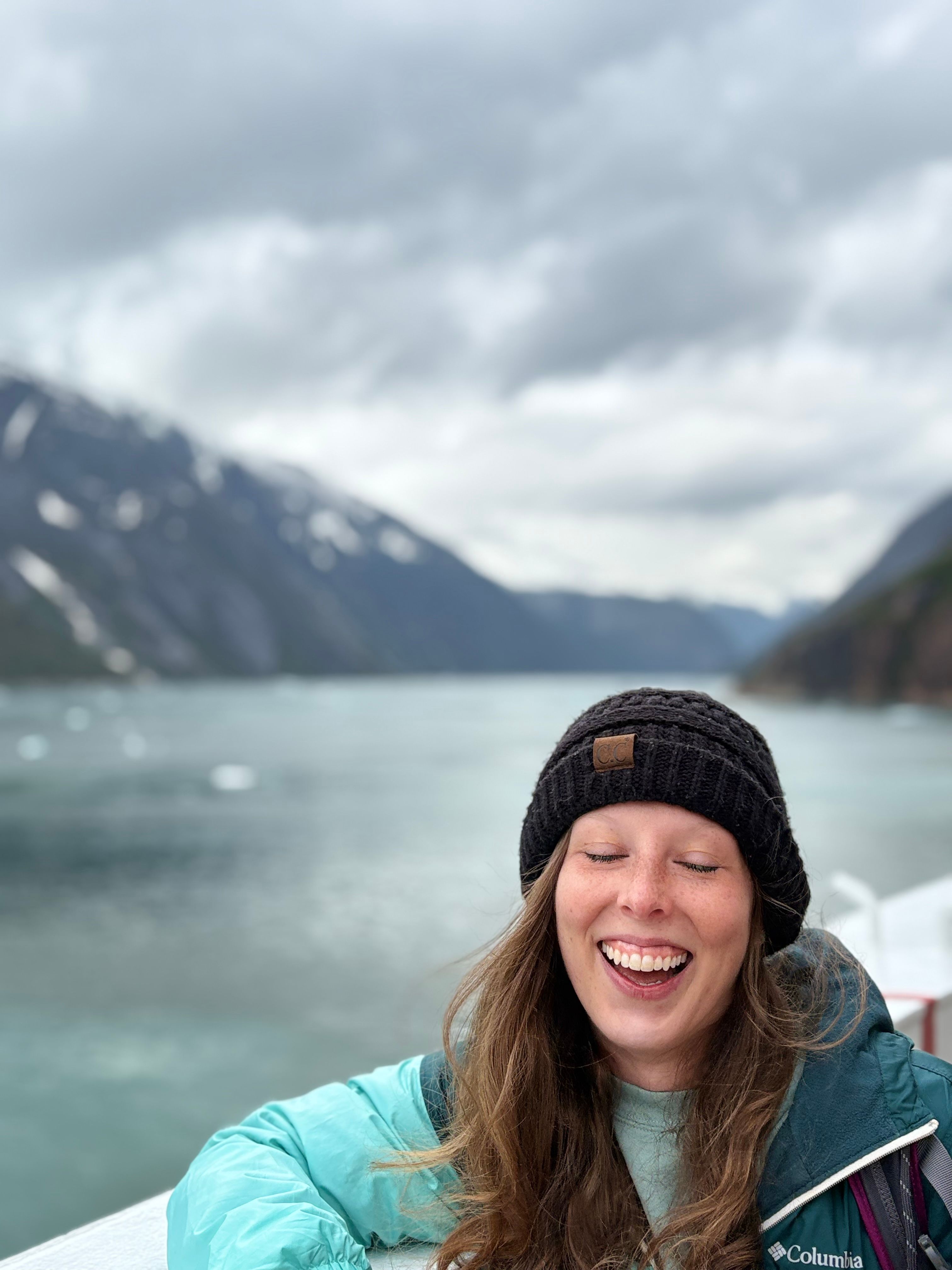 Amanda laughing on the water